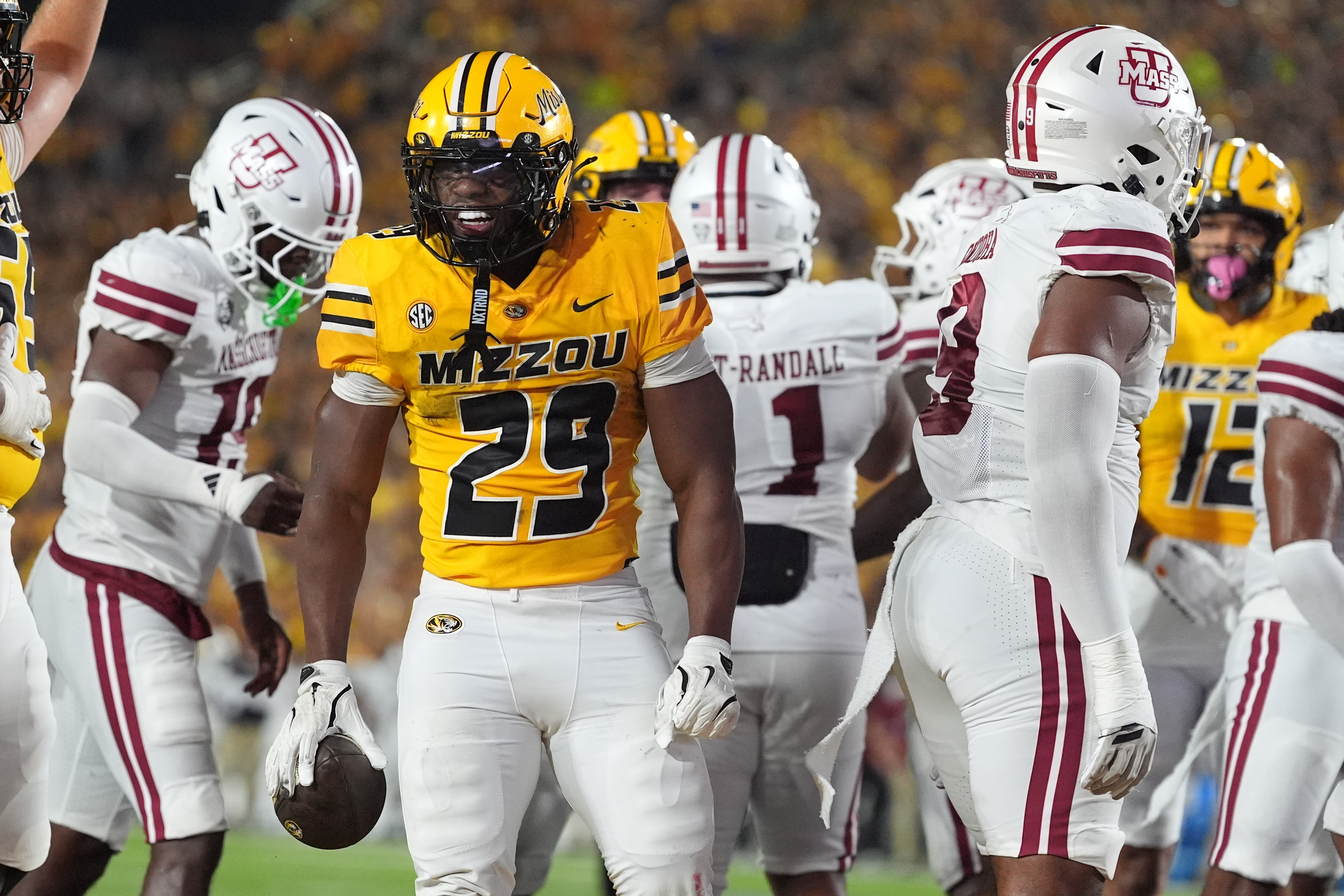 Missouri running back Ahmad Hardy (29) celebrates after scoring during the first half of an NCAA college football game against Massachusetts Saturday, Sept. 27, 2025, in Columbia, Mo. 