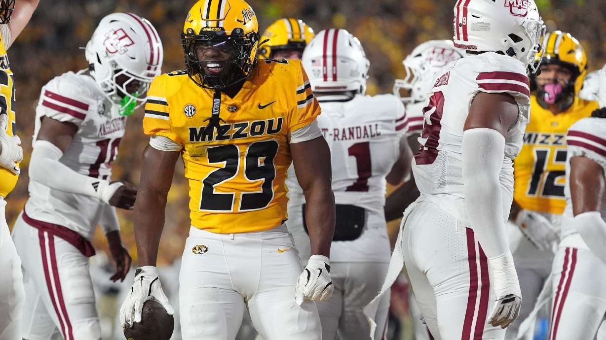 Missouri running back Ahmad Hardy (29) celebrates after scoring during the first half of an NCAA college football game against Massachusetts Saturday, Sept. 27, 2025, in Columbia, Mo.