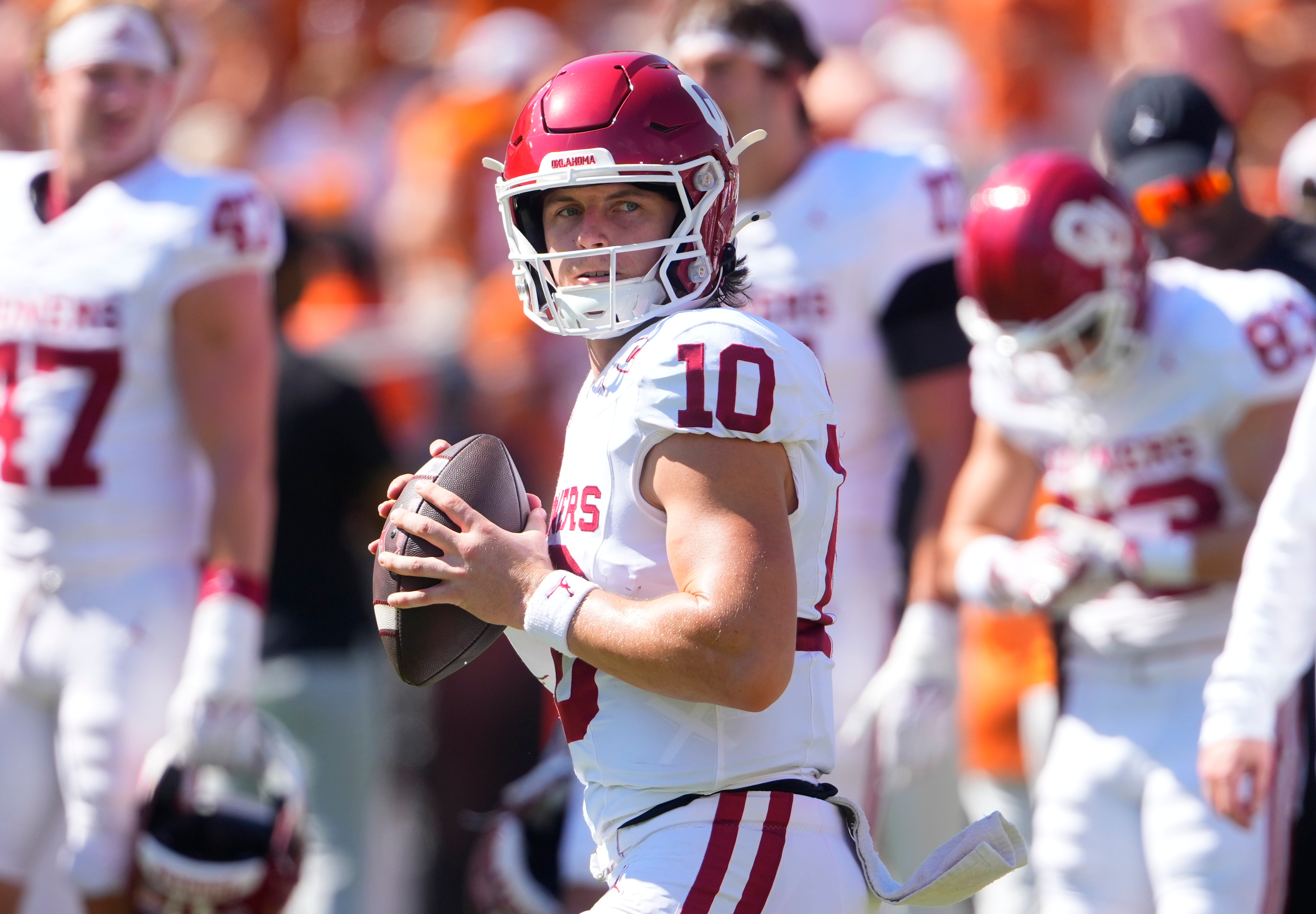 Oklahoma quarterback John Mateer warms up before an NCAA college football game against Texas at the Cotton Bowl, Saturday, Oct. 11, 2025, in Dallas. 