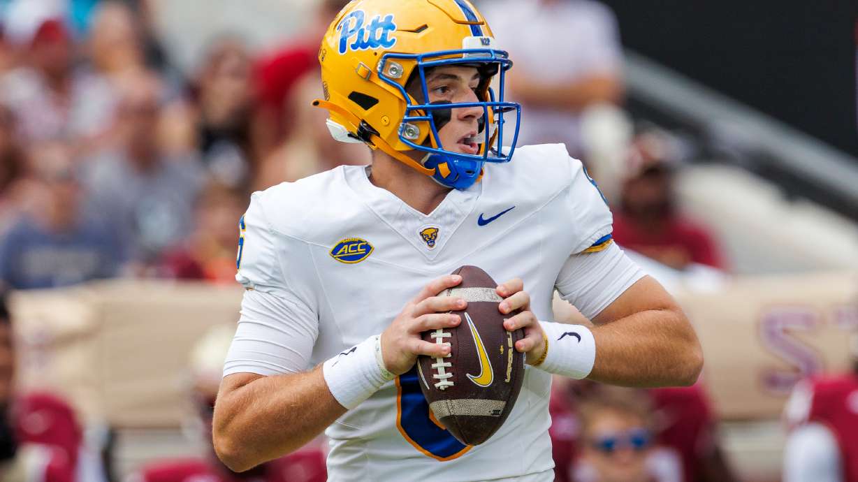 Pittsburgh quarterback Mason Heintschel (6) looks for a receiver during the first half of an NCAA college football game against Florida State, Saturday, Oct. 11, 2025, in Tallahassee, Fla.