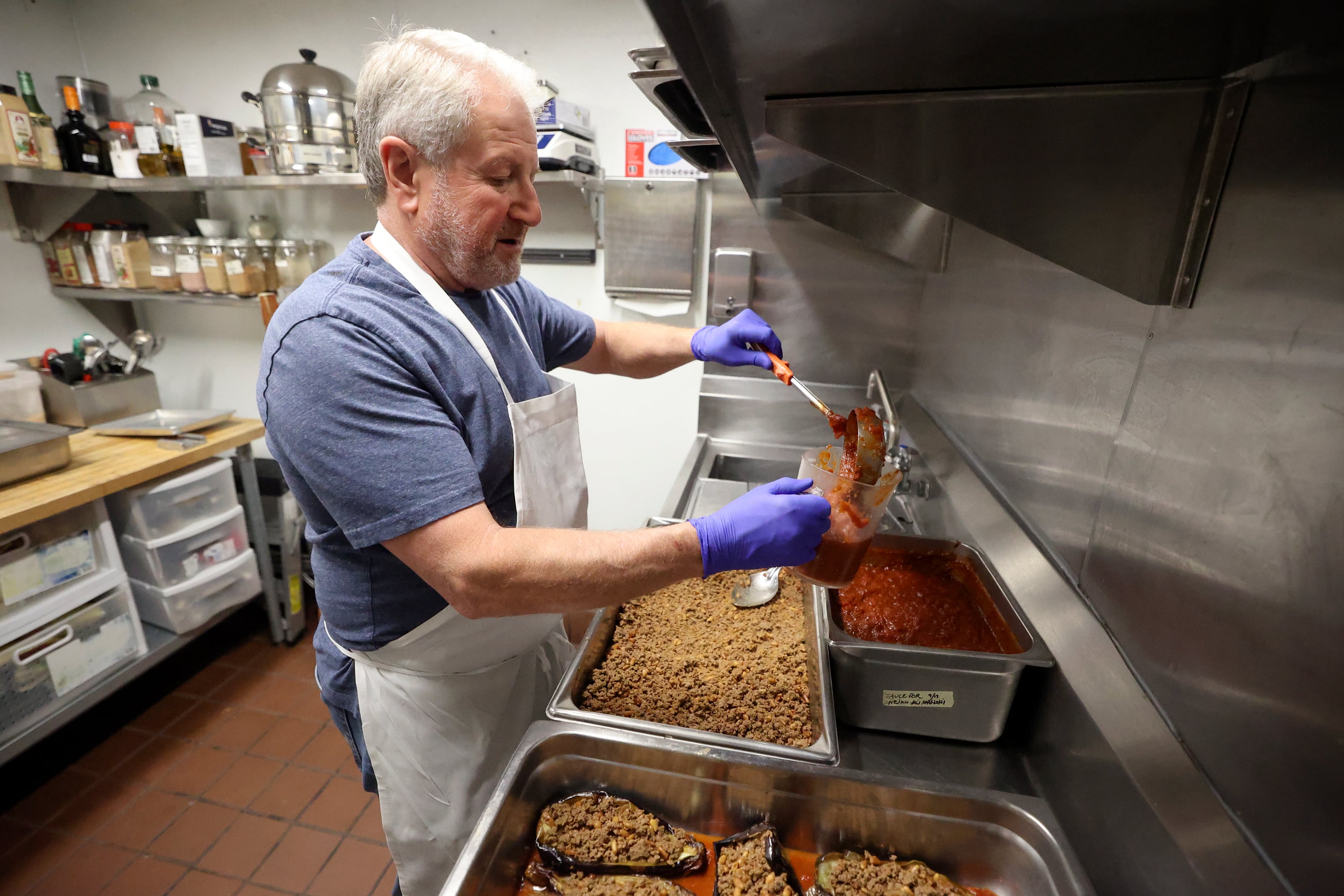 Ali Sabbah, Mazza owner and chef, prepares sheikh al mahshi, or stuffed eggplant, at Mazza in Salt Lake City on Sept. 22.