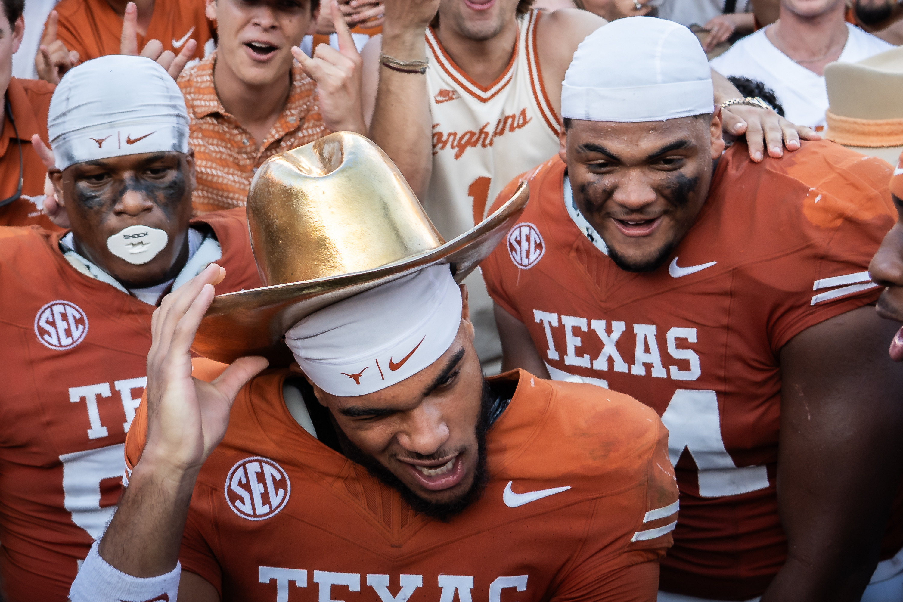 Texas wide receiver DeAndre Moore Jr. (0) celebrates beating Oklahoma in an NCAA college football game at the Cotton Bowl in Dallas, Saturday, Oct. 11, 2025.