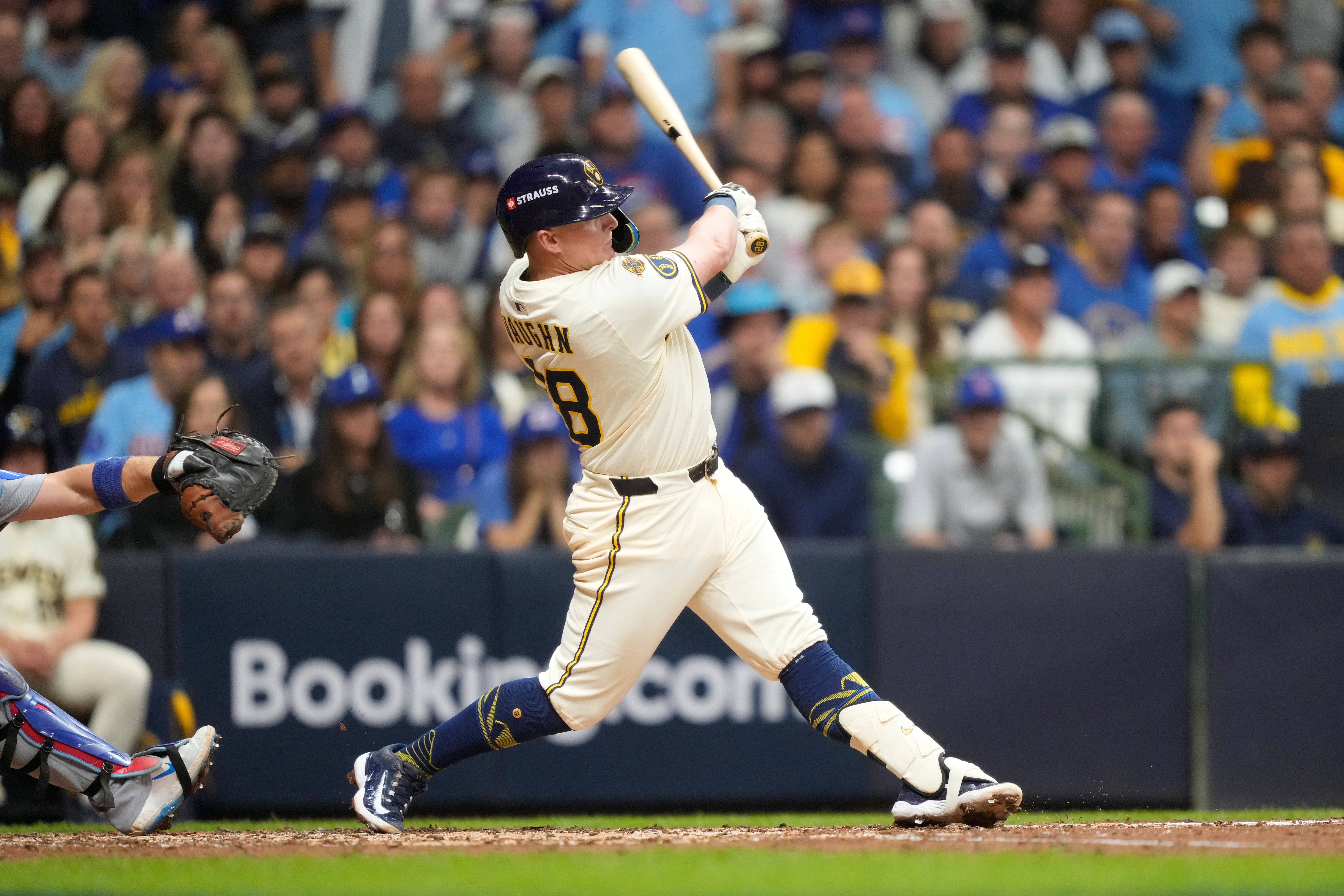 Milwaukee Brewers first baseman Andrew Vaughn (28) hits a solo home run against the Chicago Cubs during the fourth inning of Game 5 of baseball's National League Division Series, Saturday, Oct. 11, 2025, in Milwaukee.