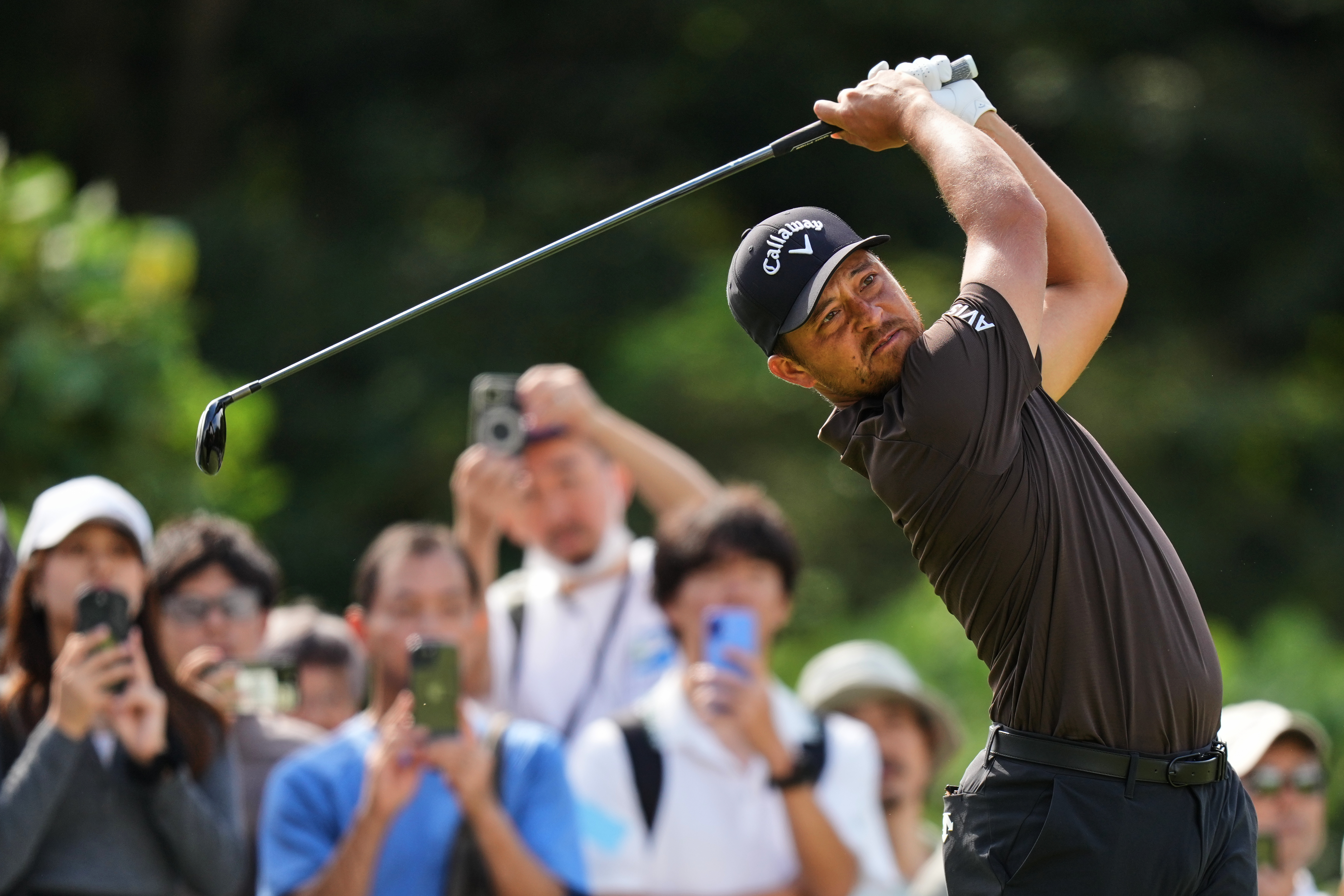 Xander Schauffele, of the U.S., tees off on the second hole during the fourth round of the Baycurrent Classic golf tournament at the Yokohama Country Club in Yokohama, near Tokyo, Sunday, Oct. 12, 2025.