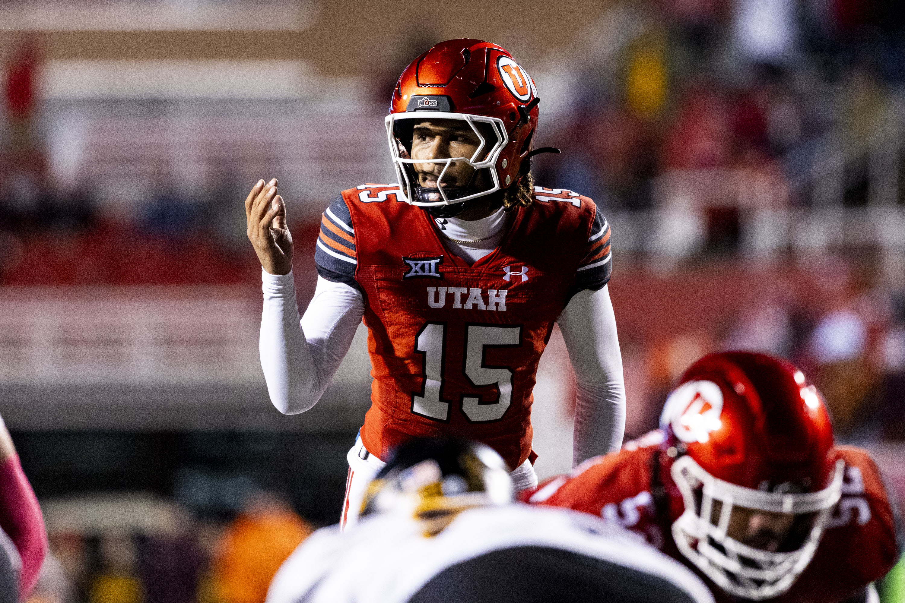 Utah quarterback Byrd Ficklin (15) calls to a player before the snap during an NCAA football game against Arizona State held at Rice-Eccles Stadium in Salt Lake City on Saturday, Oct. 11, 2025.