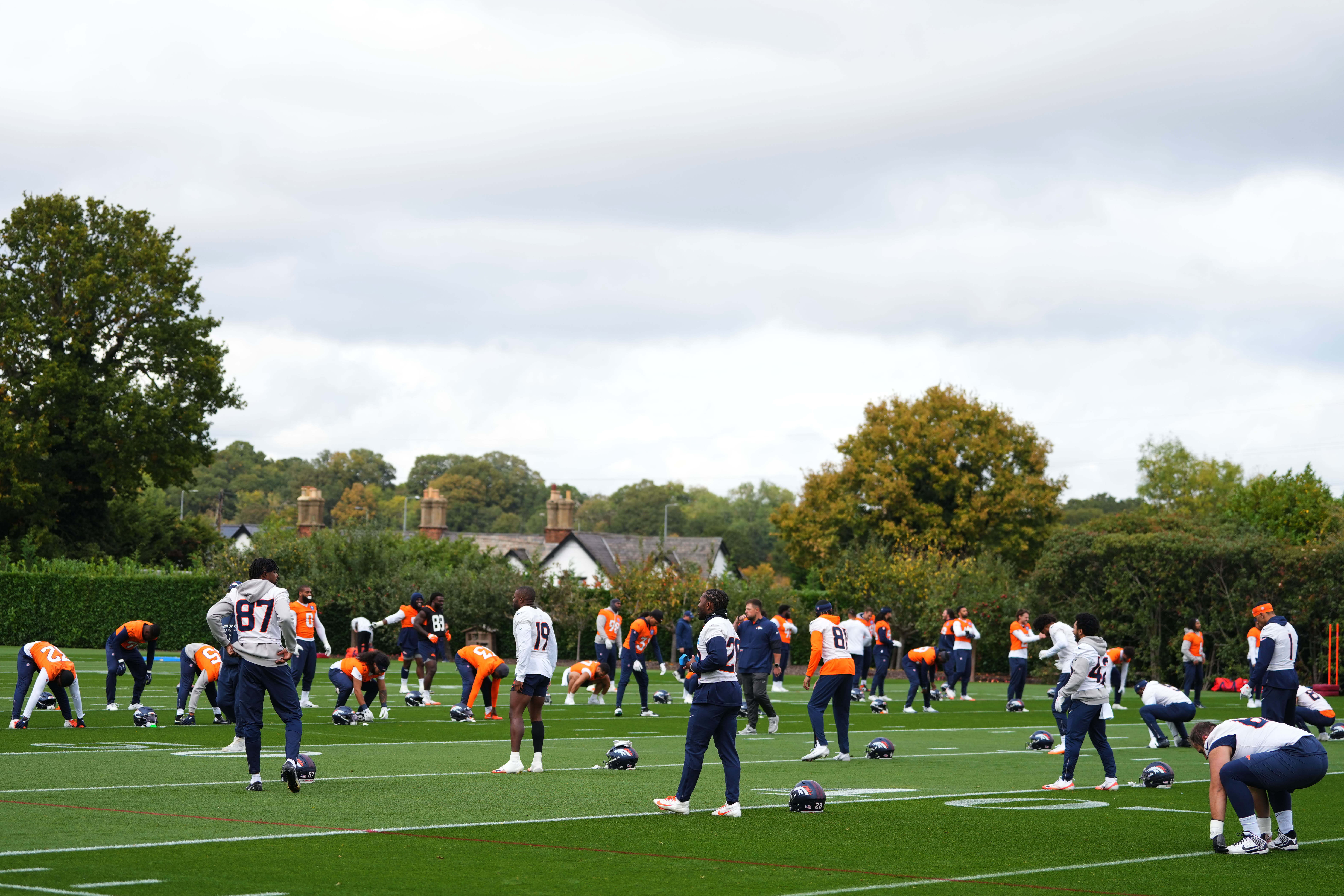 Denver Broncos take part in a NFL training session at Tottenham Hotspur training ground in London, Wednesday, Oct. 8, 2025.