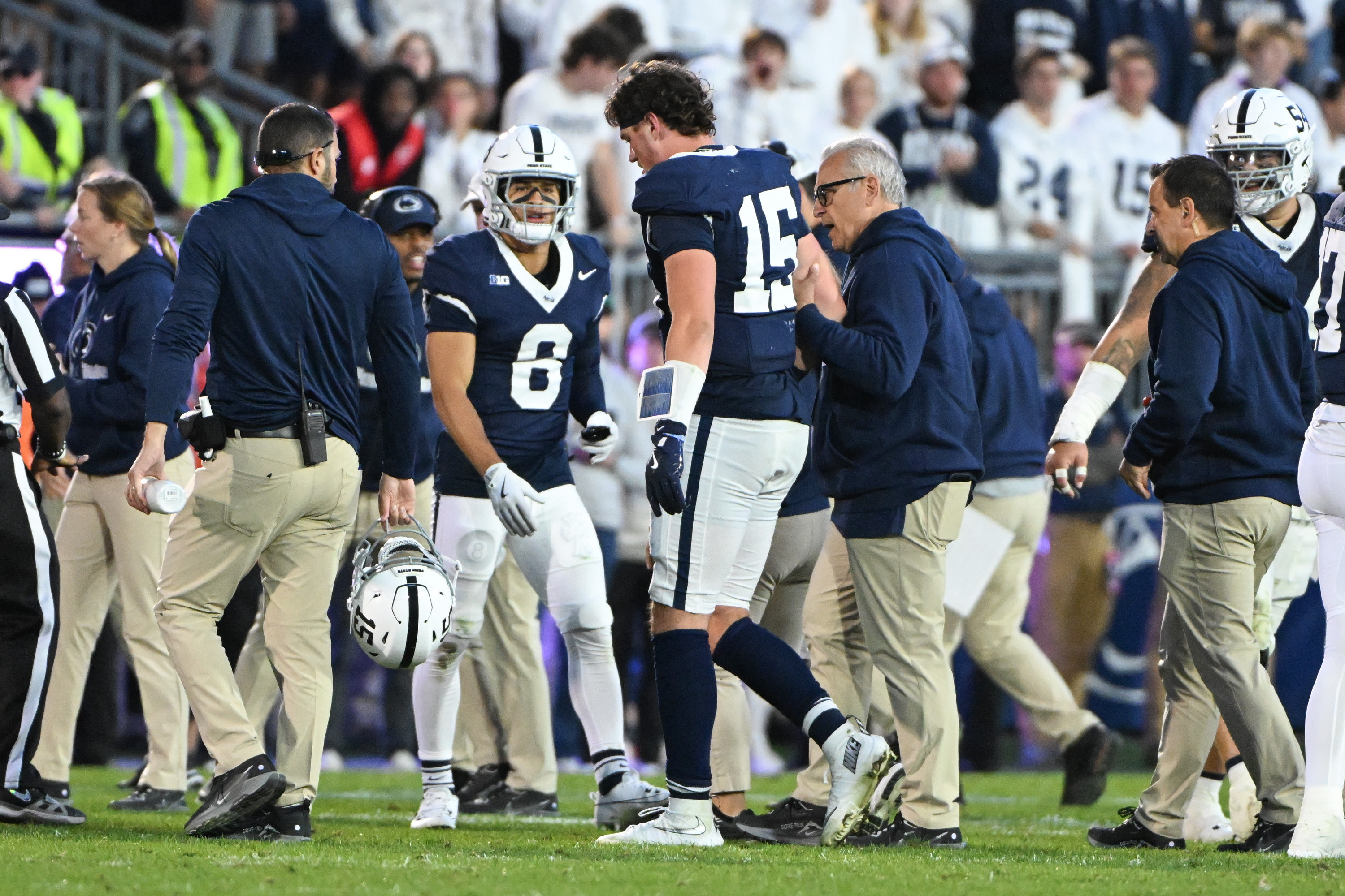 Penn State quarterback Drew Allar (15) walks off the field injured during the fourth quarter of an NCAA college football game against Northwestern, Saturday, Oct. 11, 2025, in State College, Pa.