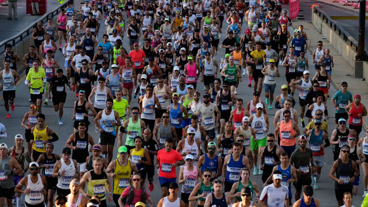 Runners participate in the Chicago Marathon, Sunday, Oct. 12, 2025.