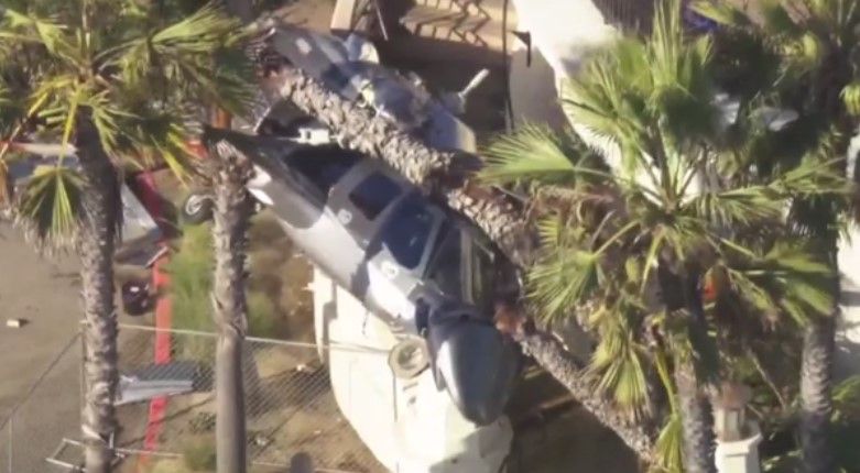 The aftermath of a helicopter crash in Huntington Beach on Saturday.