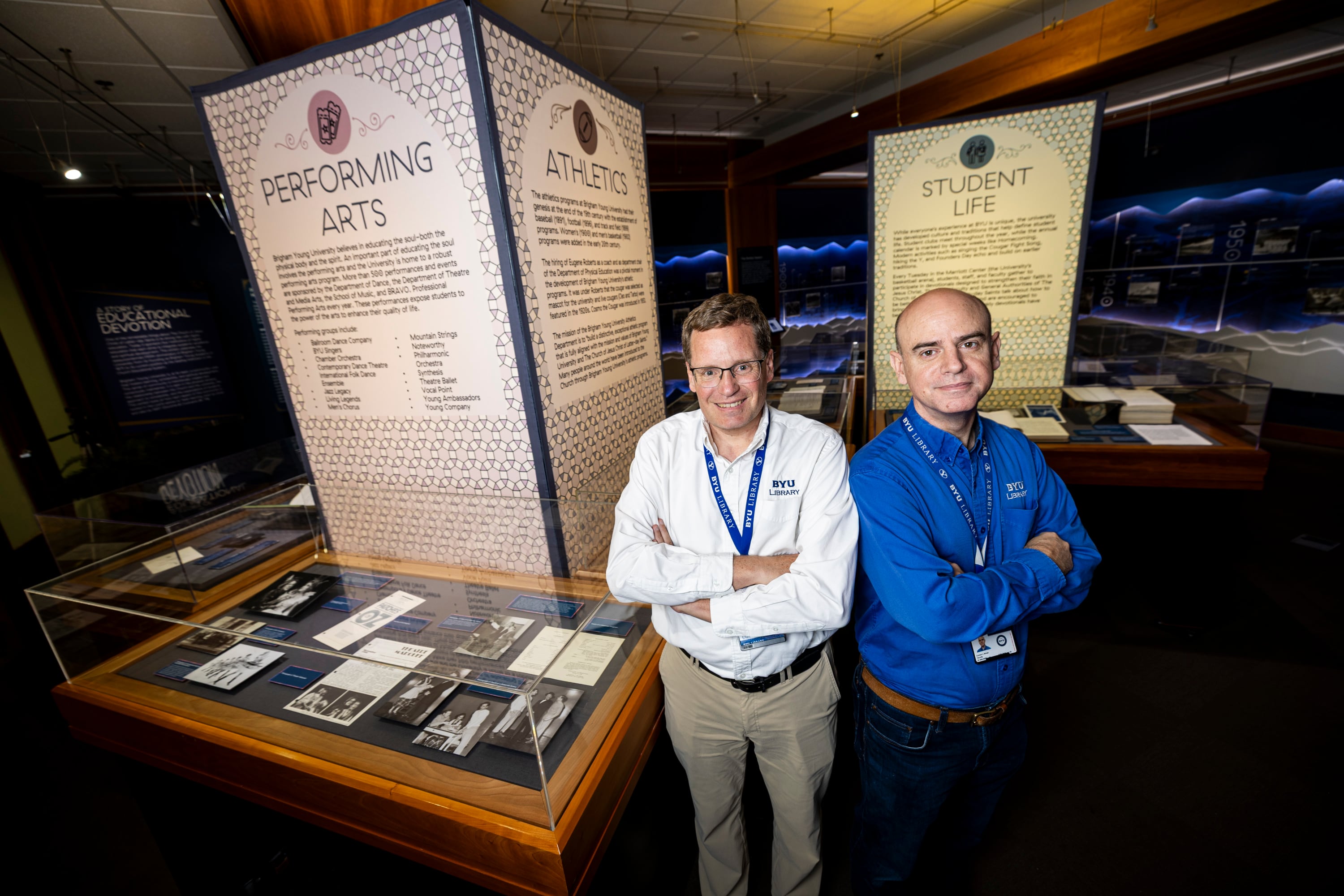 J. Gordon Daines III and Cory Nimer pose for a portrait in the exhibit they helped create, titled “By Study and By Faith: 150 Years of Brigham Young University,” at BYU's Harold B. Lee Library in Provo on Oct. 2.
