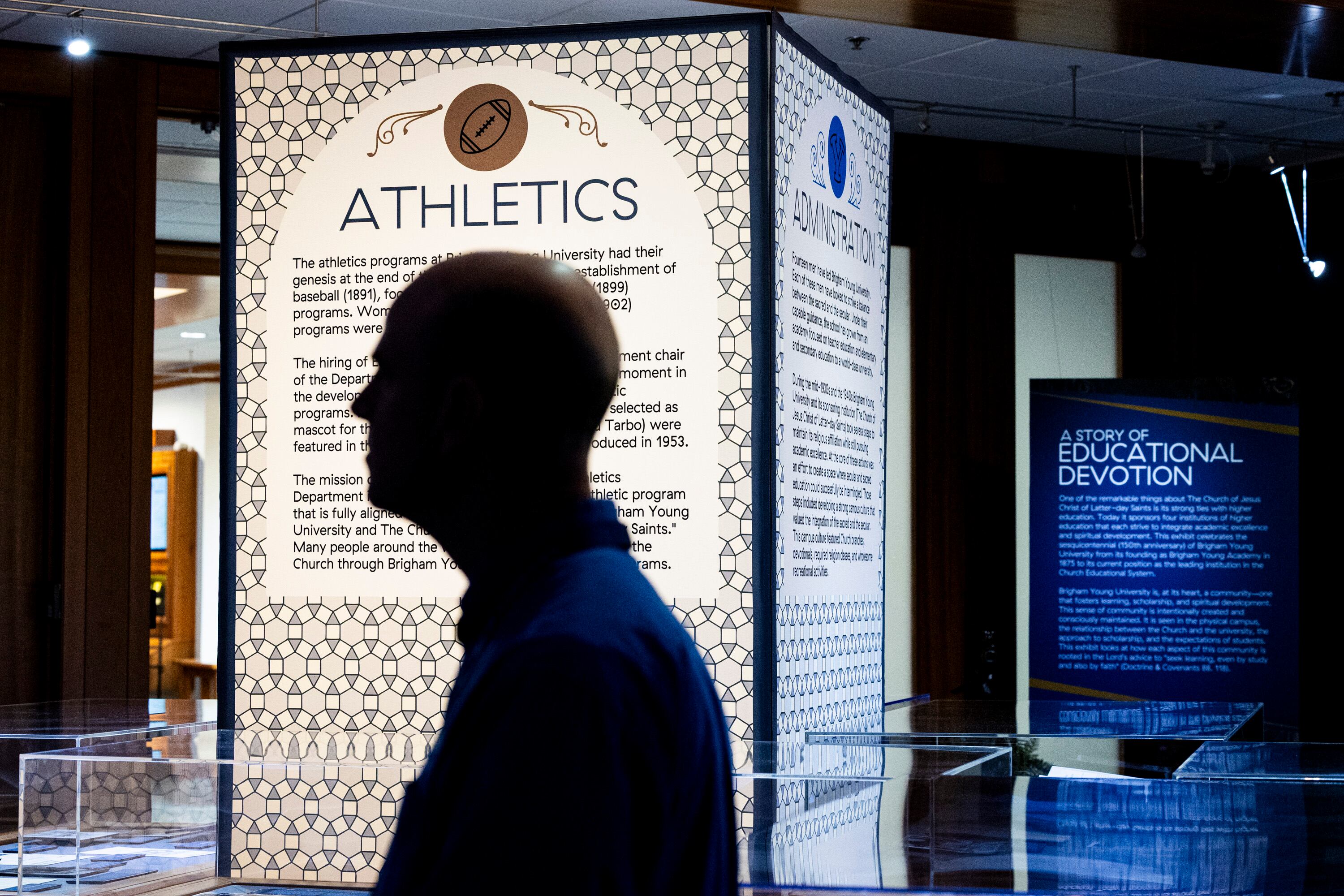 Cory Nimer, university archivist and a senior librarian at BYU’s L. Tom Perry Special Collections, stands in the exhibit he helped create, titled, “By Study and By Faith: 150 Years of Brigham Young University,” on the first floor of the Harold B. Lee Library on the campus of BYU in Provo on Oct. 2.