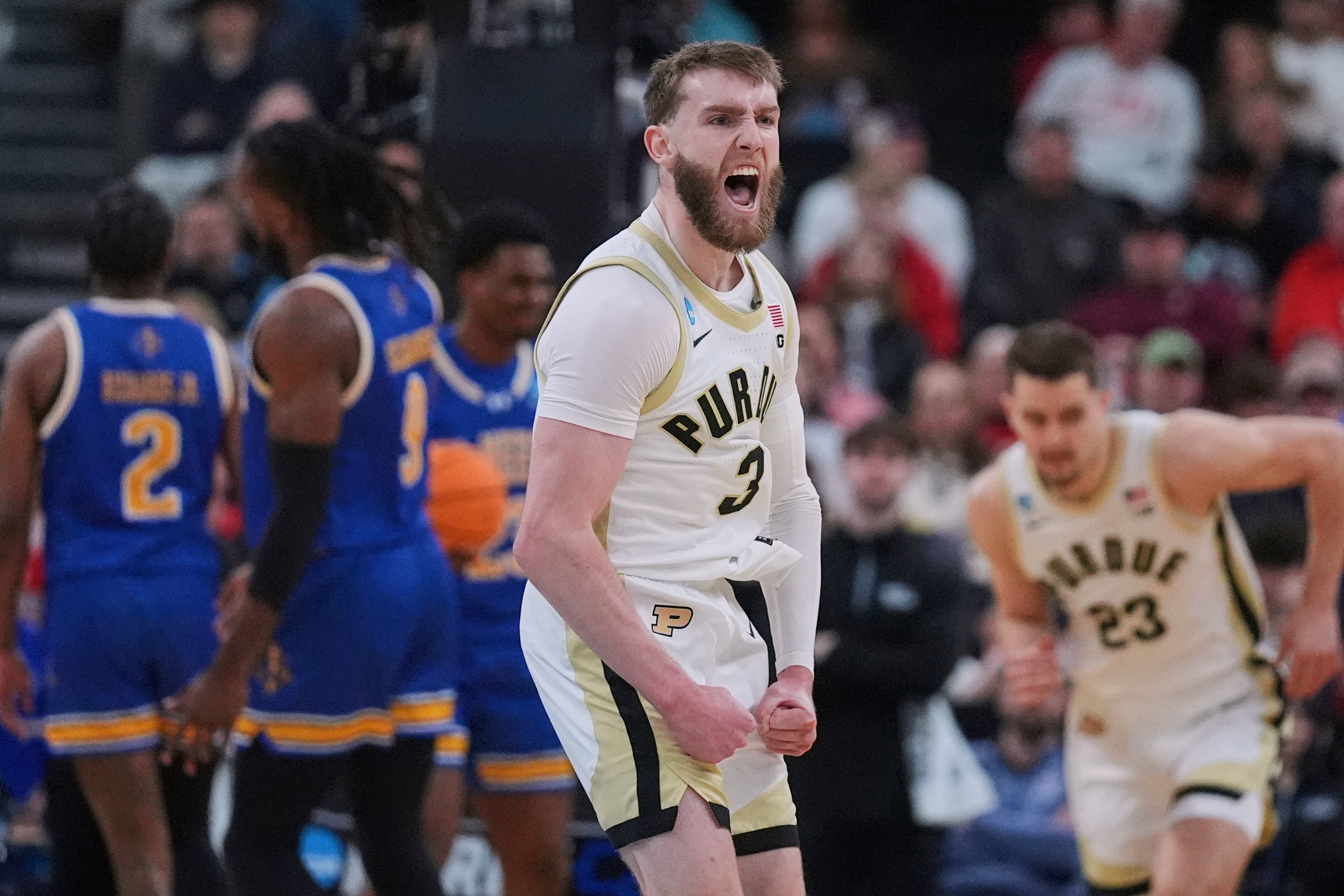 FILE - Purdue guard Braden Smith (3) celebrates while taking a lead against McNeese State during the first half in the second round of the NCAA college basketball tournament, Saturday, March 22, 2025, in Providence, R.I.