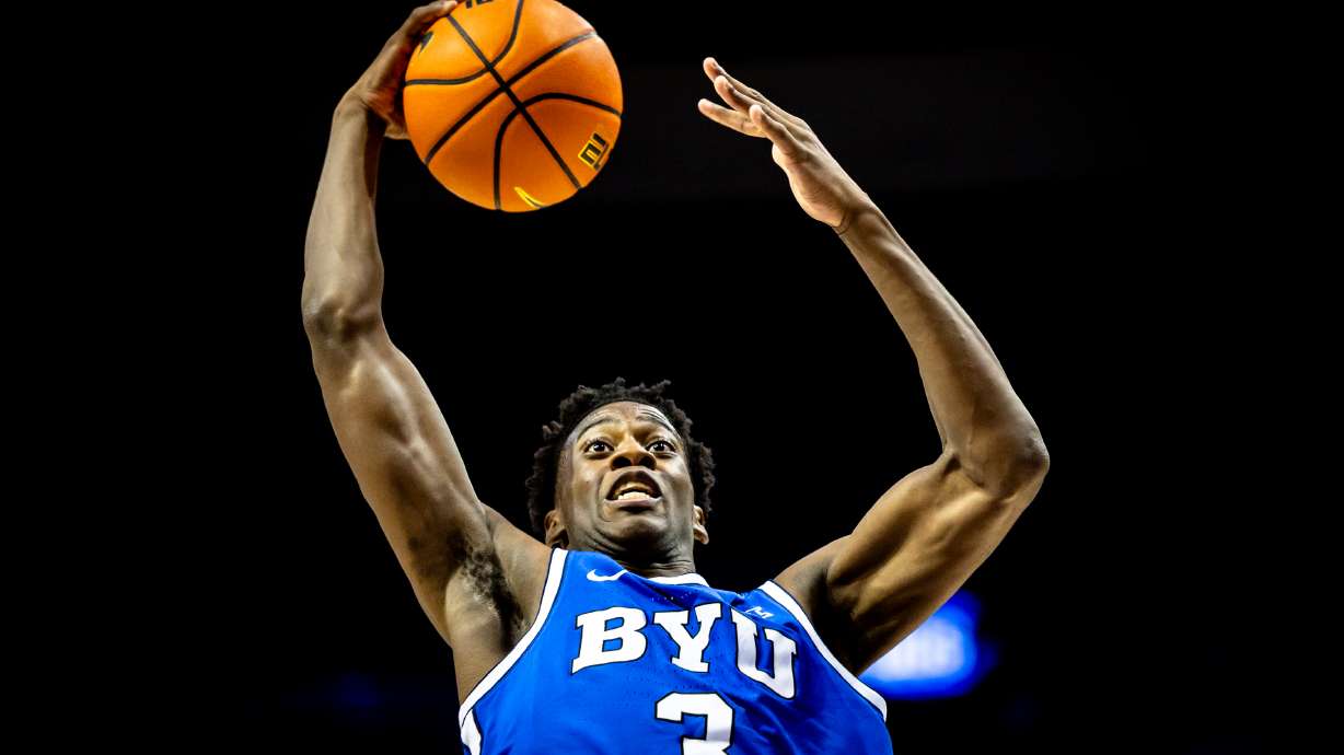 BYU basketball player AJ Dybantsa jumps up to make a basket during BYU's annual Blue-White Scrimmage at the Marriott Center in Provo on Thursday, Oct. 9, 2025.
