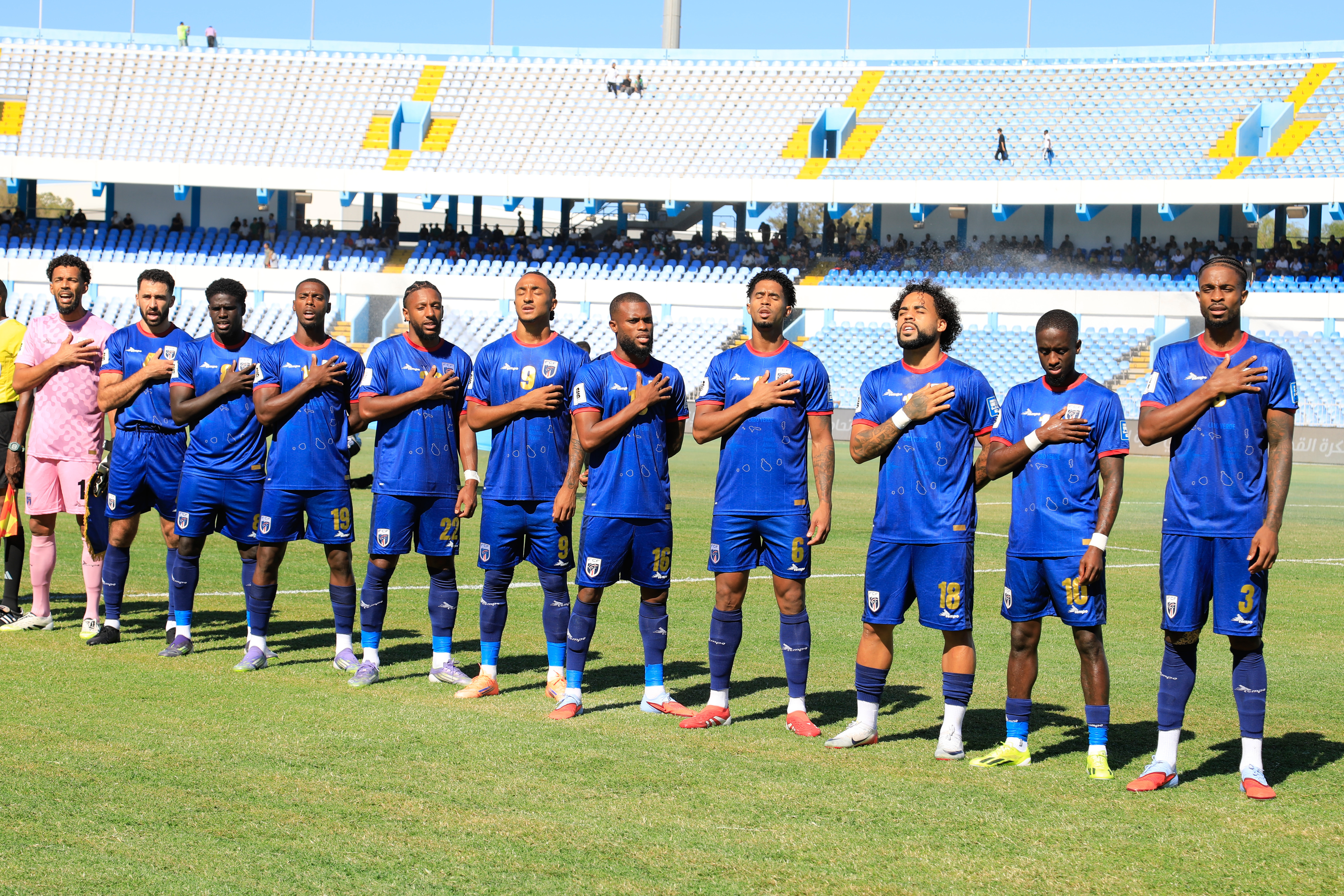 Cape Verde players stand for the national anthem during the World Cup 2026 African qualifier Group D soccer match between Libya and Cape Verde in Tripoli, Libya, Wednesday, Oct. 8, 2025. 