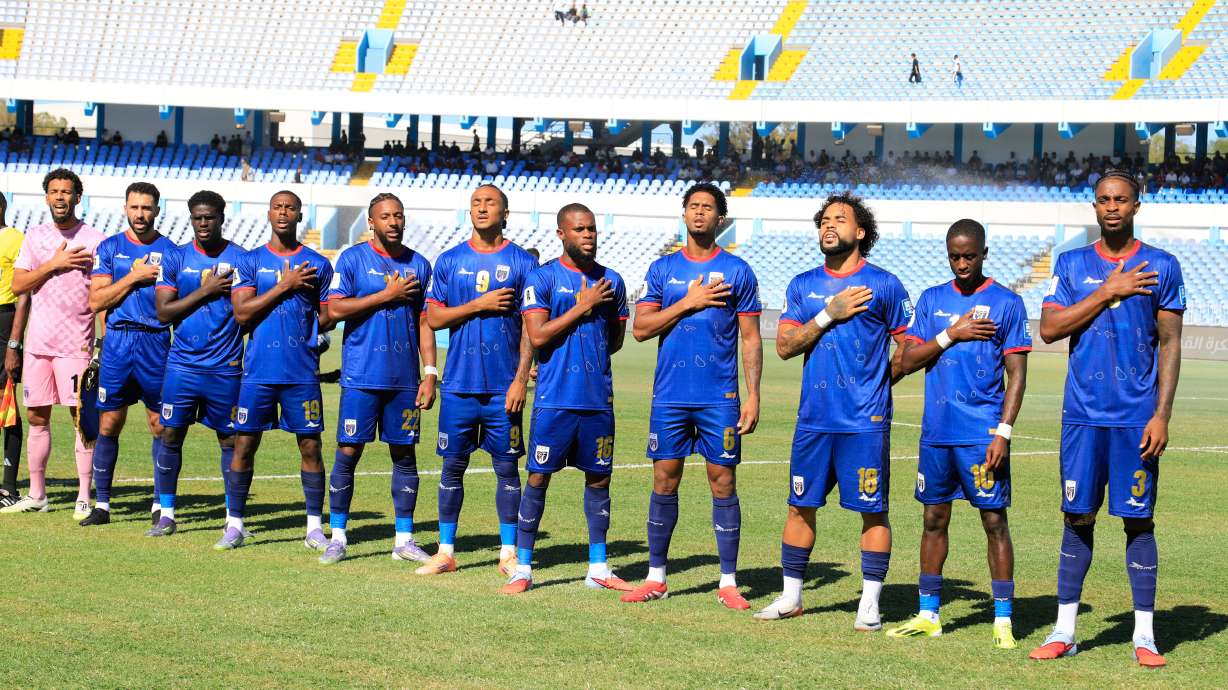 Cape Verde players stand for the national anthem during the World Cup 2026 African qualifier Group D soccer match between Libya and Cape Verde in Tripoli, Libya, Wednesday, Oct. 8, 2025.