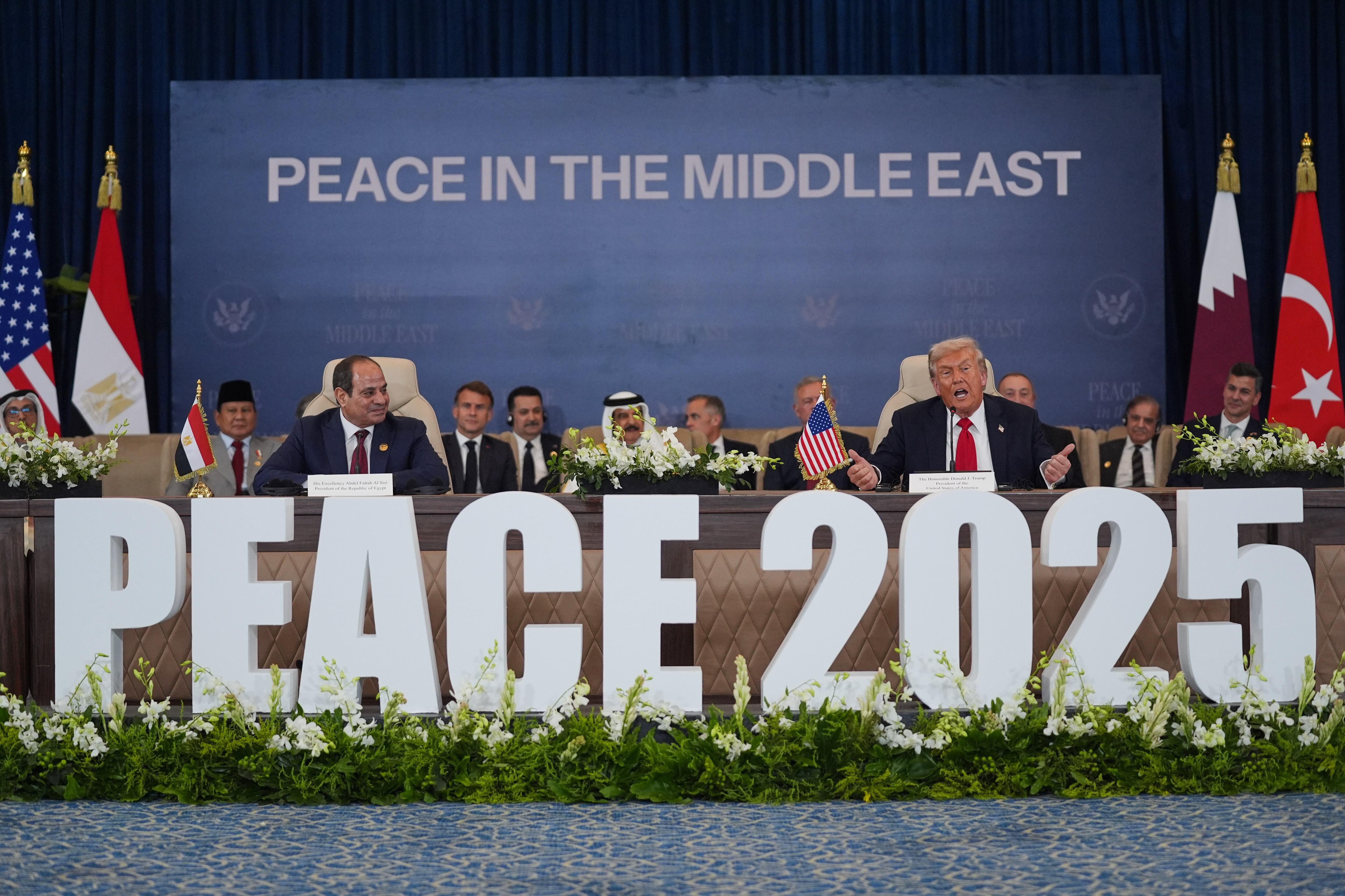 President Donald Trump speaks during a summit to support ending the more than two-year Israel-Hamas war in Gaza after a breakthrough ceasefire deal, Monday, in Sharm El Sheikh, Egypt, as Egypt's President Abdel-Fattah el-Sissi listens at left.