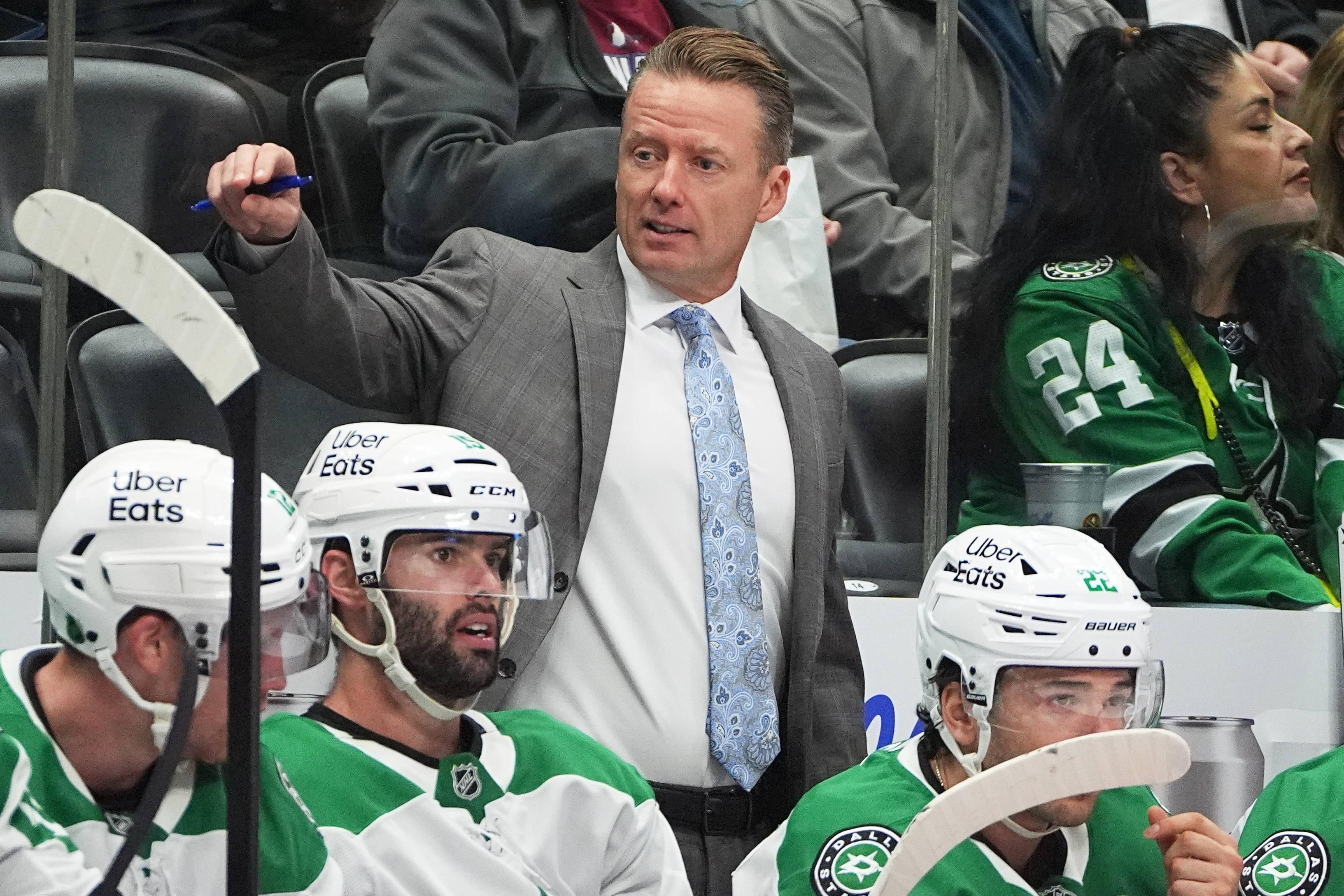 Dallas Stars head coach Glen Gulutzan directs his players in the second period of an NHL hockey game against the Colorado Avalanche, Saturday, Oct. 11, 2025, in Denver. 
