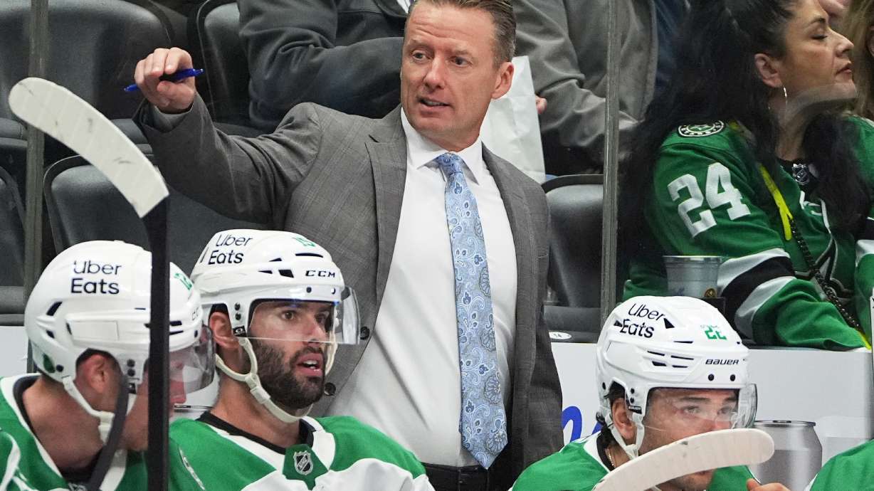 Dallas Stars head coach Glen Gulutzan directs his players in the second period of an NHL hockey game against the Colorado Avalanche, Saturday, Oct. 11, 2025, in Denver.