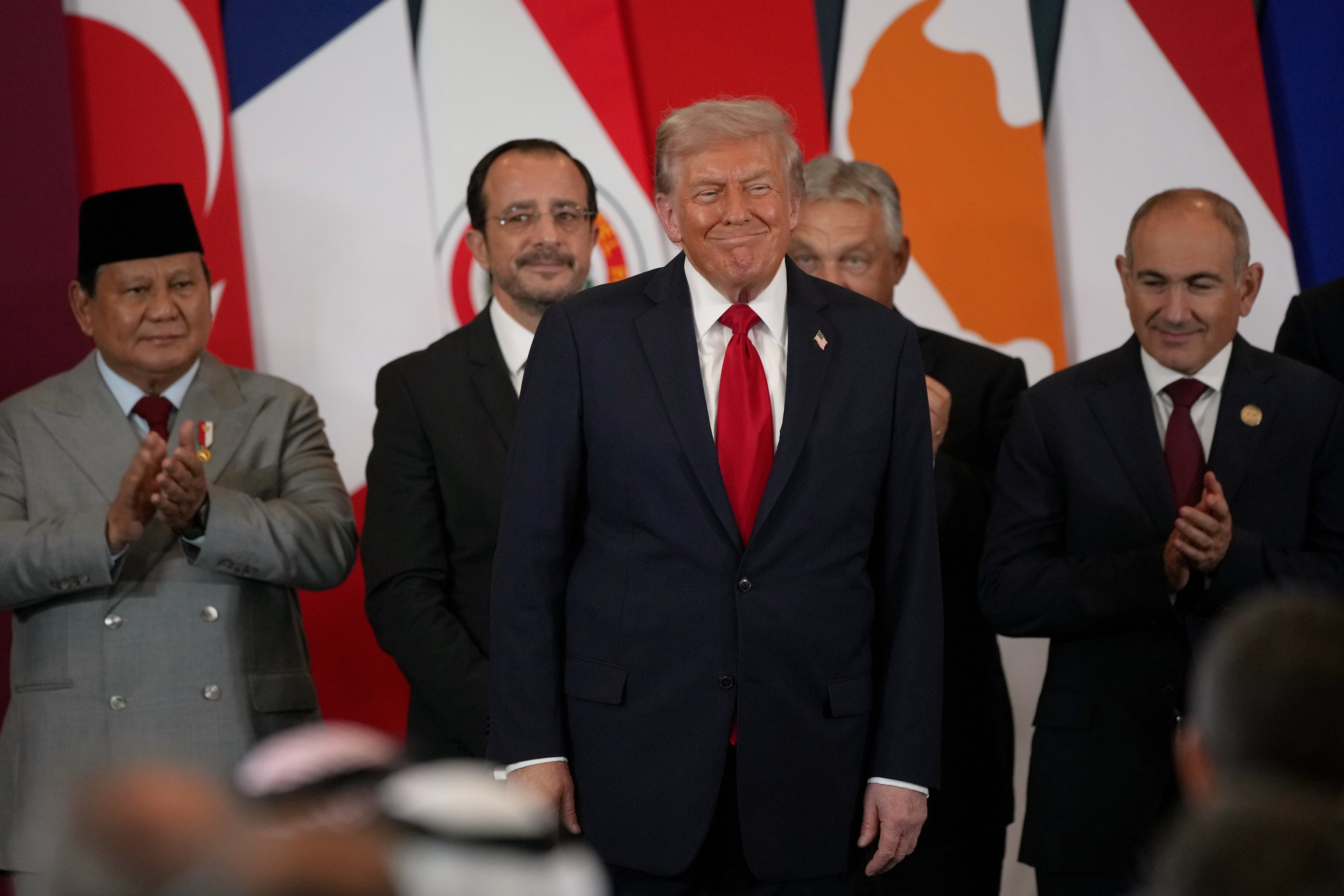 President Donald Trump smiles during a summit to support ending the more than two-year Israel-Hamas war in Gaza after a breakthrough ceasefire deal, Monday, in Sharm El Sheikh, Egypt.