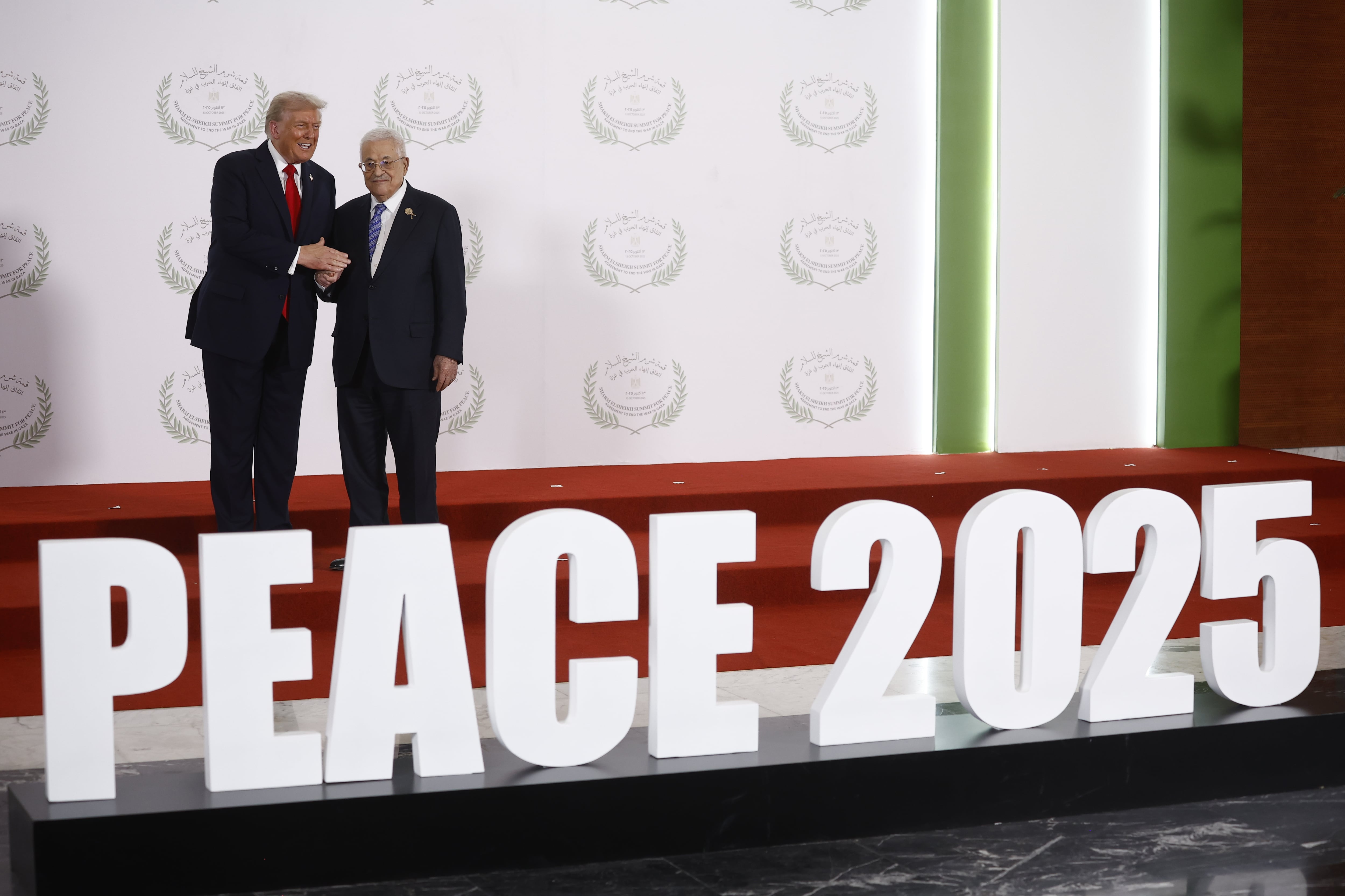 President Donald Trump and Palestinian President Mahmoud Abbas pose at the Gaza Peace Summit in Sharm el-Sheikh, Egypt, Monday.