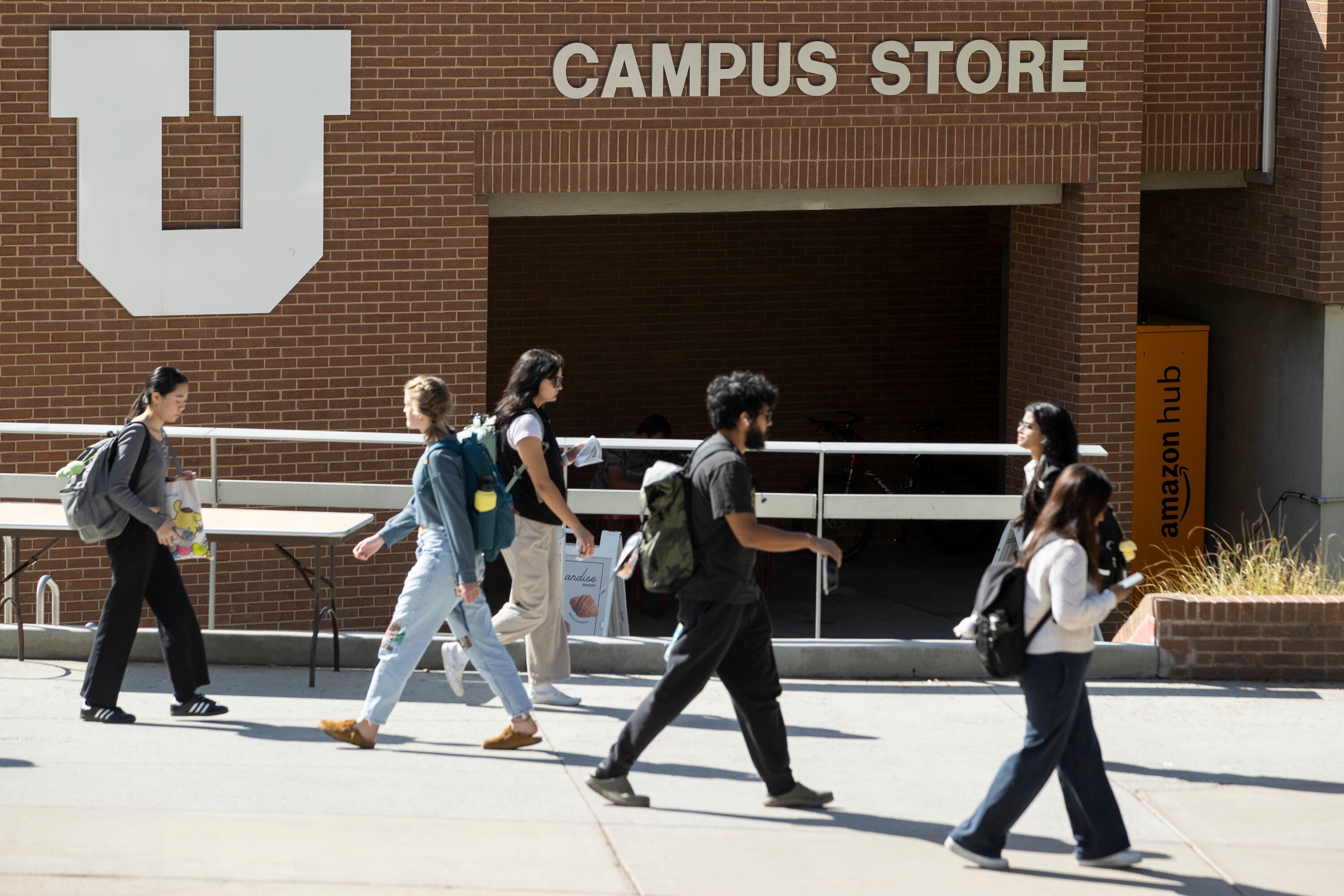 Students walk past the Campus Store on the University of Utah campus in Salt Lake City on Sept. 26.