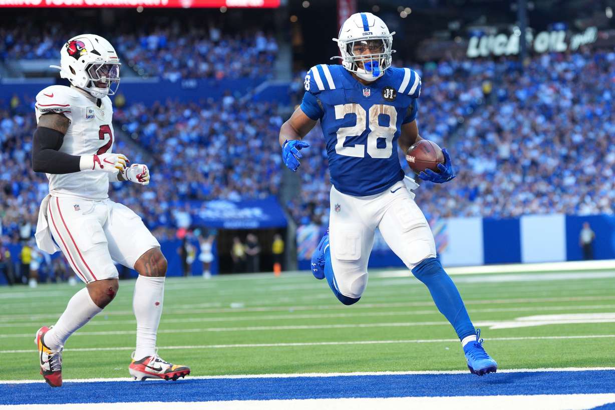 Indianapolis Colts' Jonathan Taylor runs for a touchdown during the second half of an NFL football game against the Arizona Cardinals Sunday, Oct. 12, 2025, in Indianapolis.