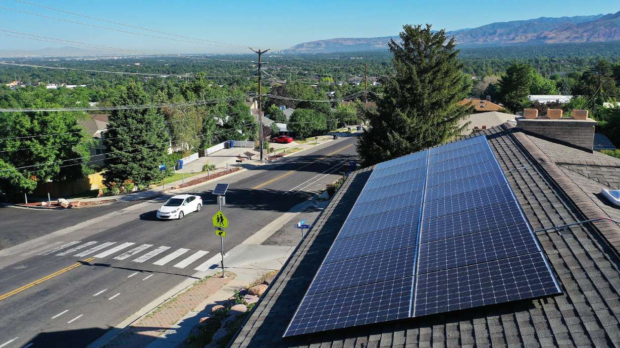 Solar panels on a roof in Cottonwood Heights on July 12, 2023. A new analysis puts Utah seventh in the nation overall for its energy efficiency, fifth in the country for home energy efficiency and ninth for vehicle fuel efficiency.