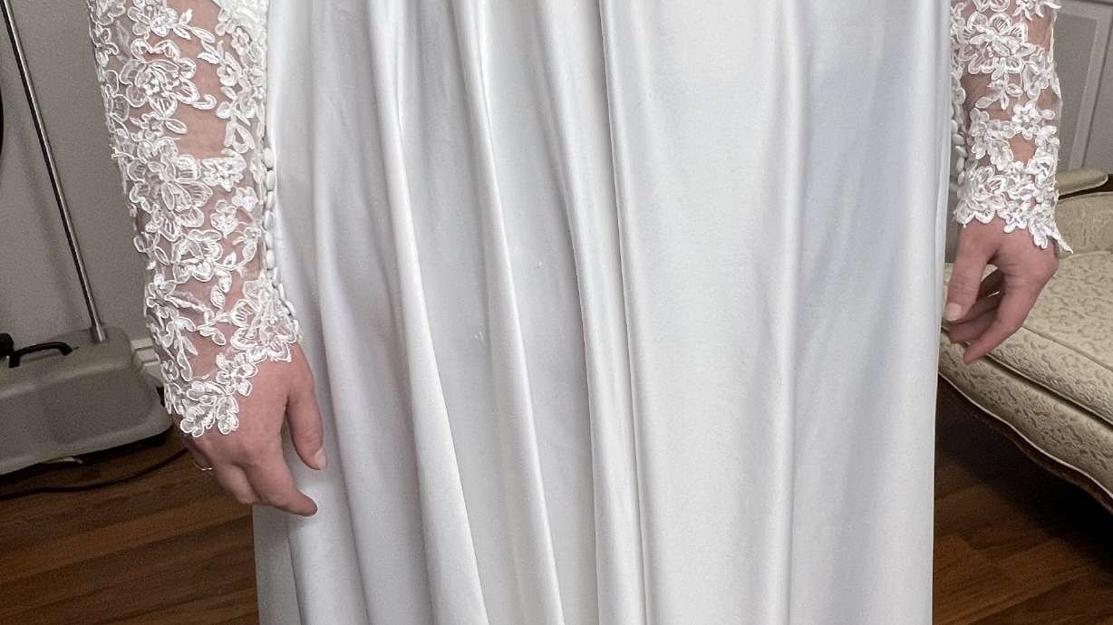 A Utah woman says her sister's wedding dress was stolen from her car sometime Monday night. The alleged theft comes just days before she was set to travel to another country for her wedding.