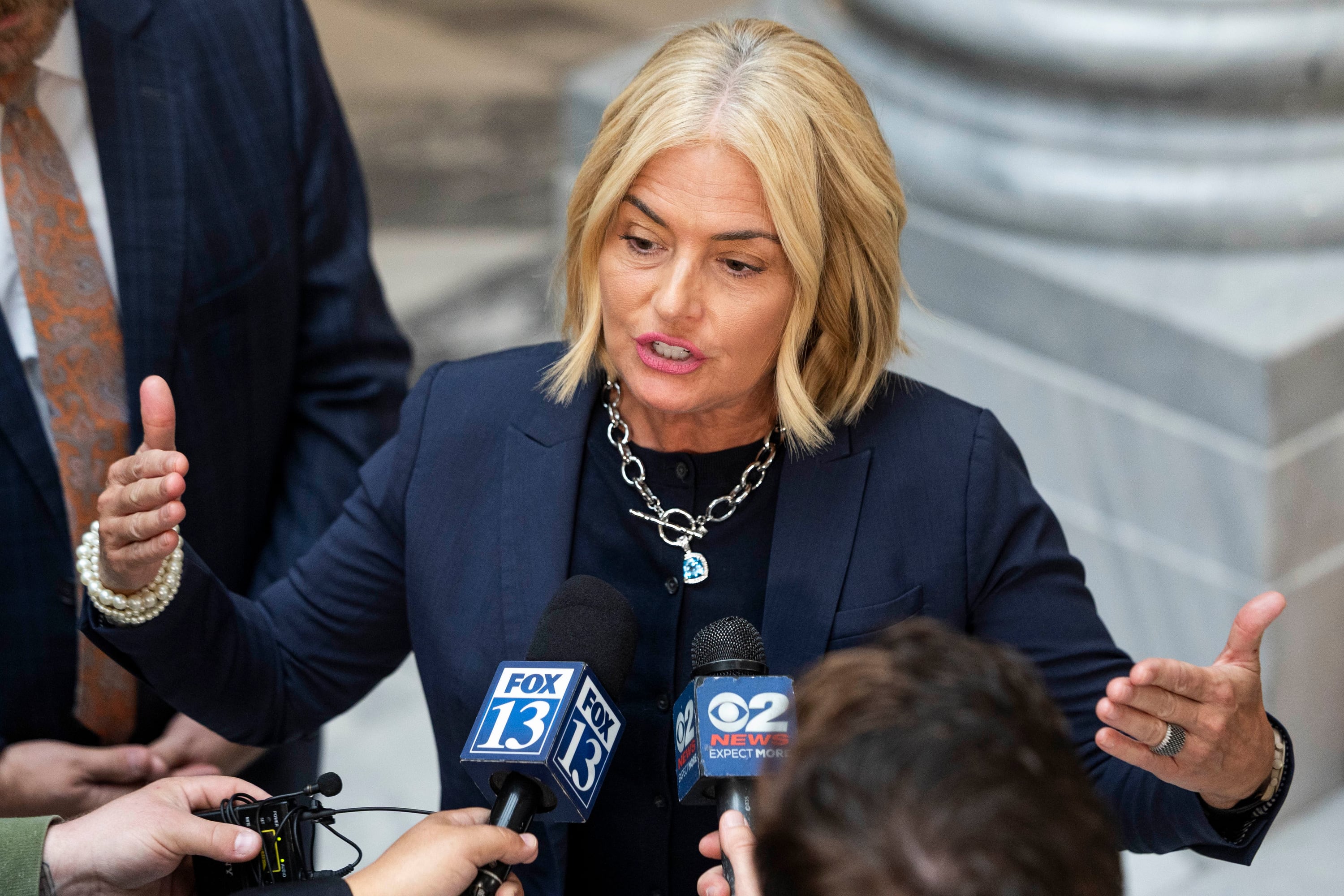 Carolyn Phippen speaks with media at the Capitol in Salt Lake City on Tuesday. Phippen was one of the co-signers on an initiative to repeal Proposition 4 and toss out the new congressional map approved by the Legislature.