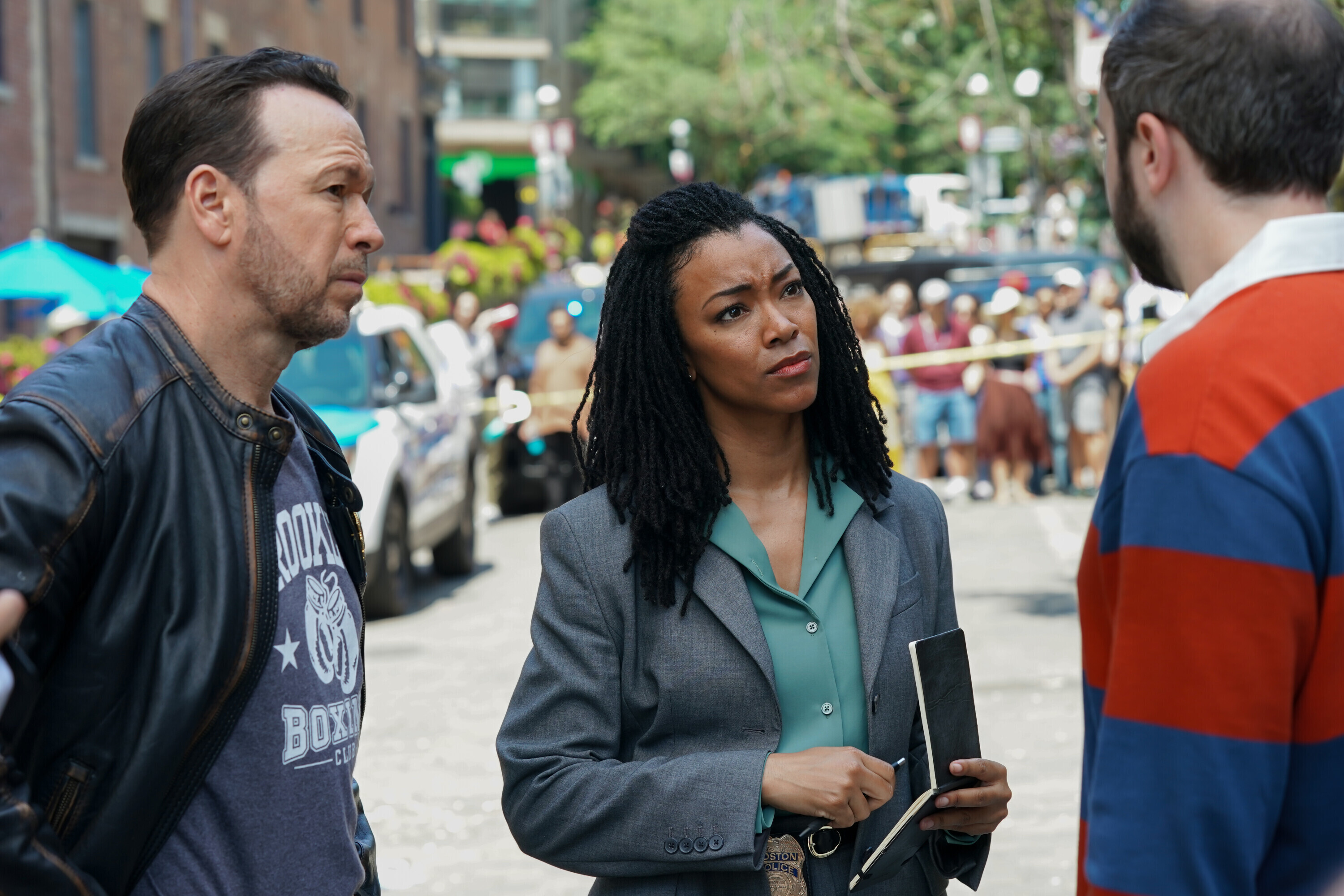 This image released by CBS shows Donnie Wahlberg, left, and Sonequa Martin-Green in a scene from "Boston Blue." 