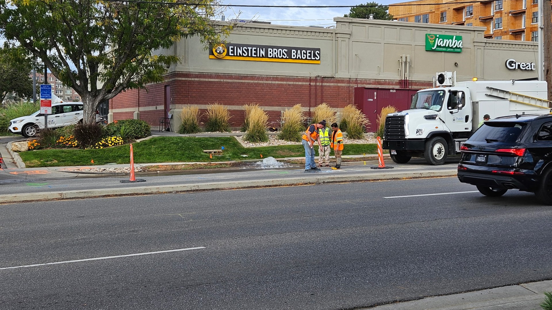 Salt Lake City Department of Public Utilities crews evaluate a water main break along 3300 South by the Salt Lake City-Millcreek border on Tuesday.