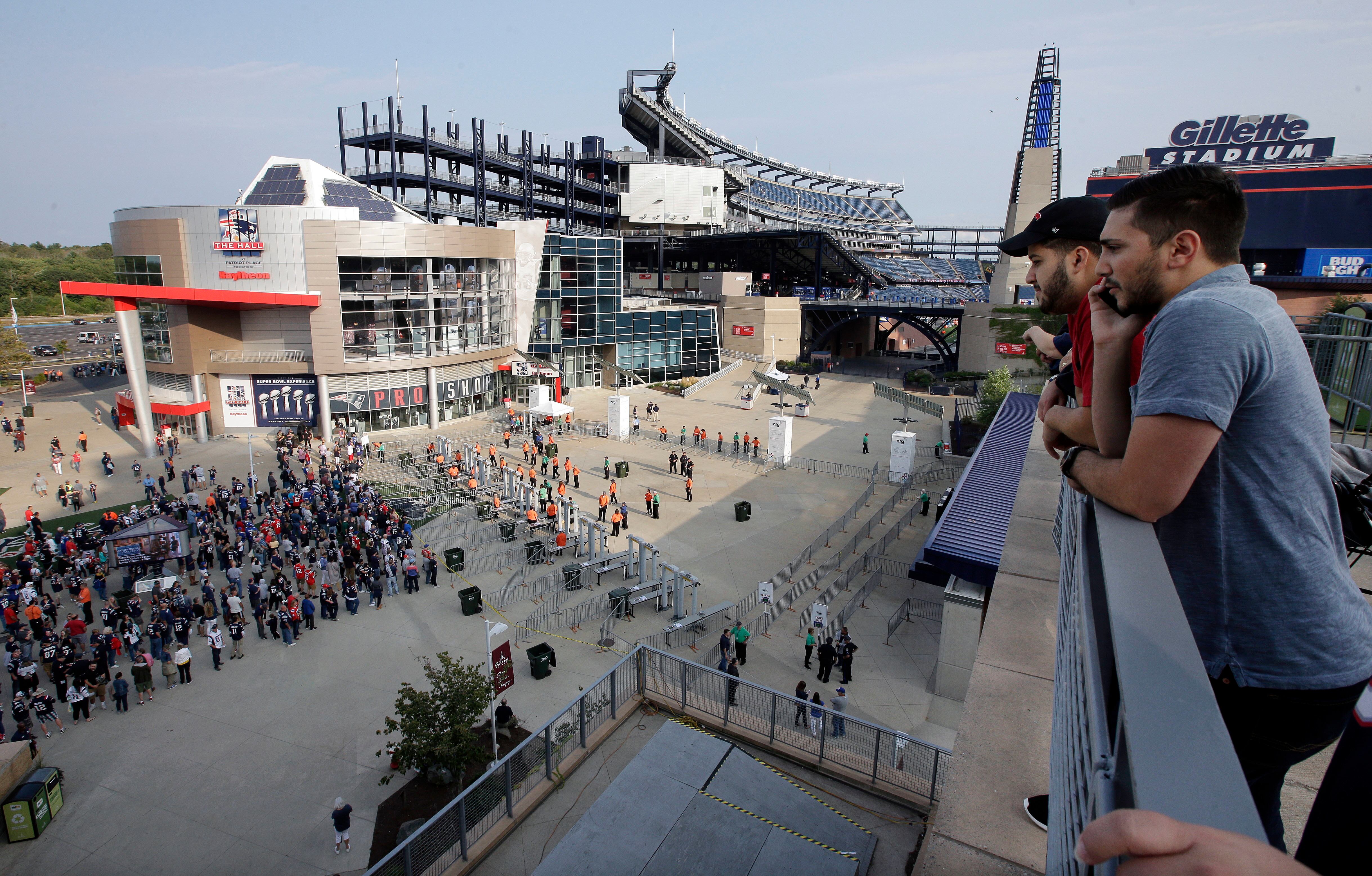 Fans arrive at Gillette Stadium for an NFL preseason game, Aug. 31, 2017, in Foxborough, Mass. President Donald Trump said on Wednesday that FIFA will need to decide whether to allow Boston and the stadium to host World Cup matches next year.