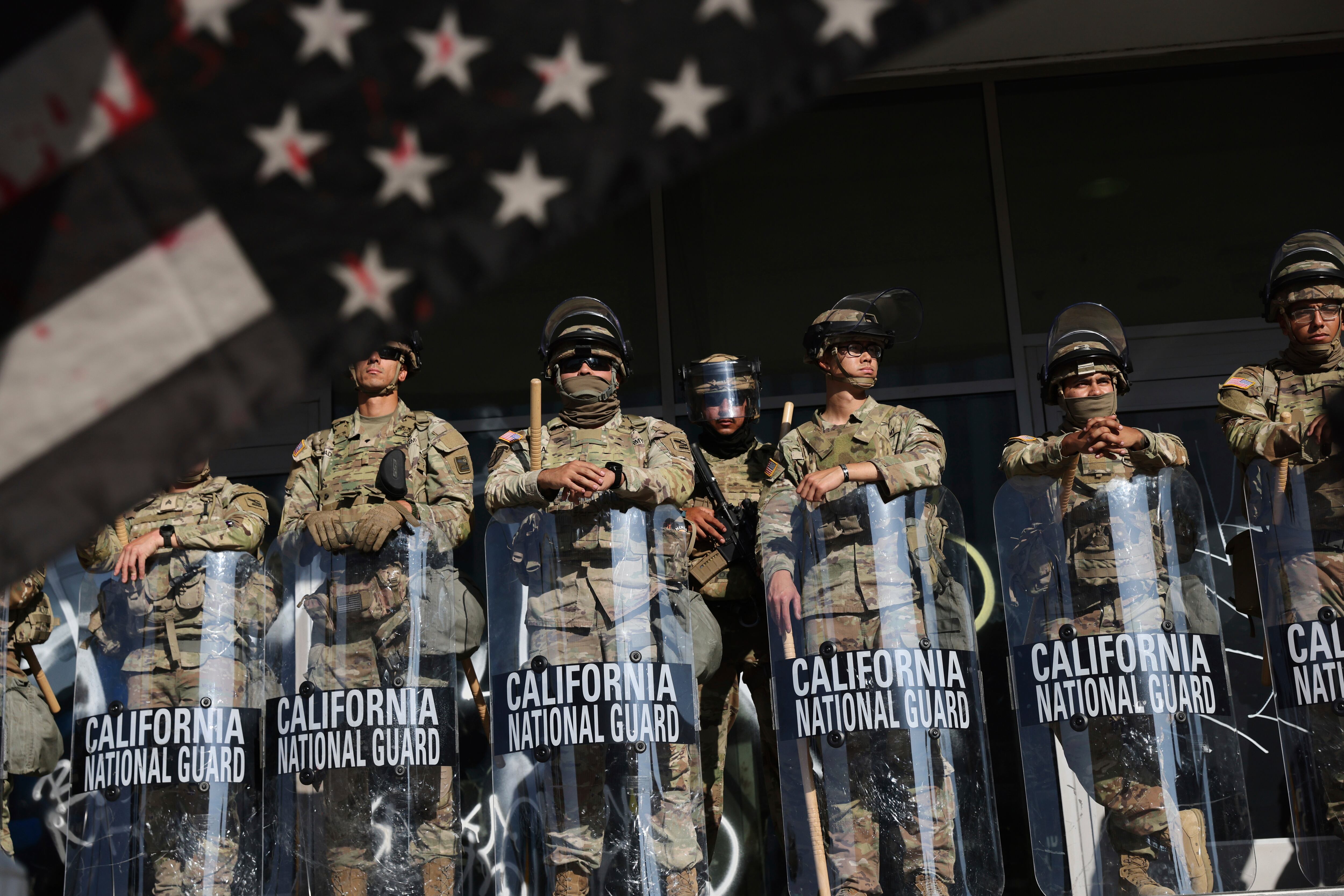 National Guard soldiers are posted in Los Angeles during a demonstration in response to a series of Immigration and Customs Enforcement raids throughout the country, on June 10. President Donald Trump threatened California Gov. Gavin Newsom to "get his act together" prior to the 2028 Summer Olympics in the city.