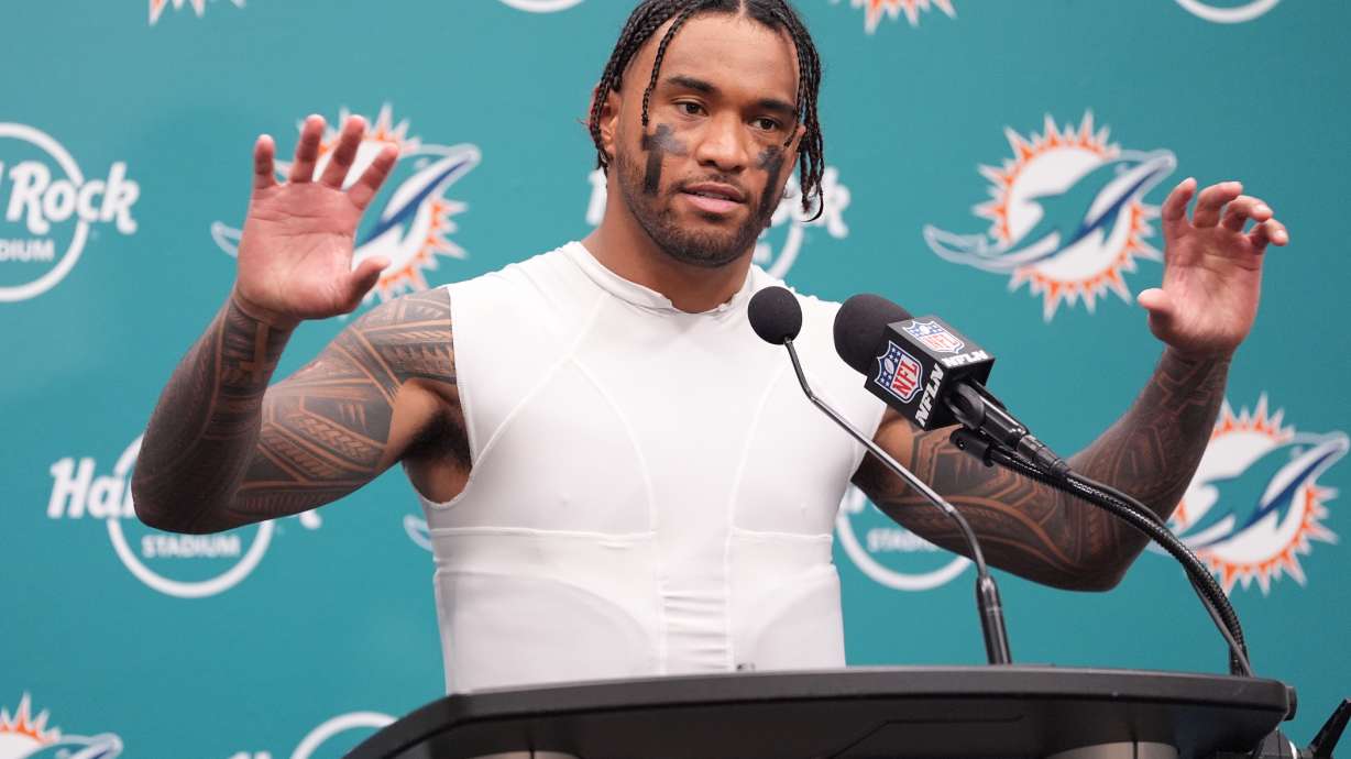 Miami Dolphins quarterback Tua Tagovailoa speaks at a news conference after the Los Angeles Chargers defeated the Dolphins 29-27 in an NFL football game Sunday, Oct. 12, 2025, in Miami Gardens, Fla.