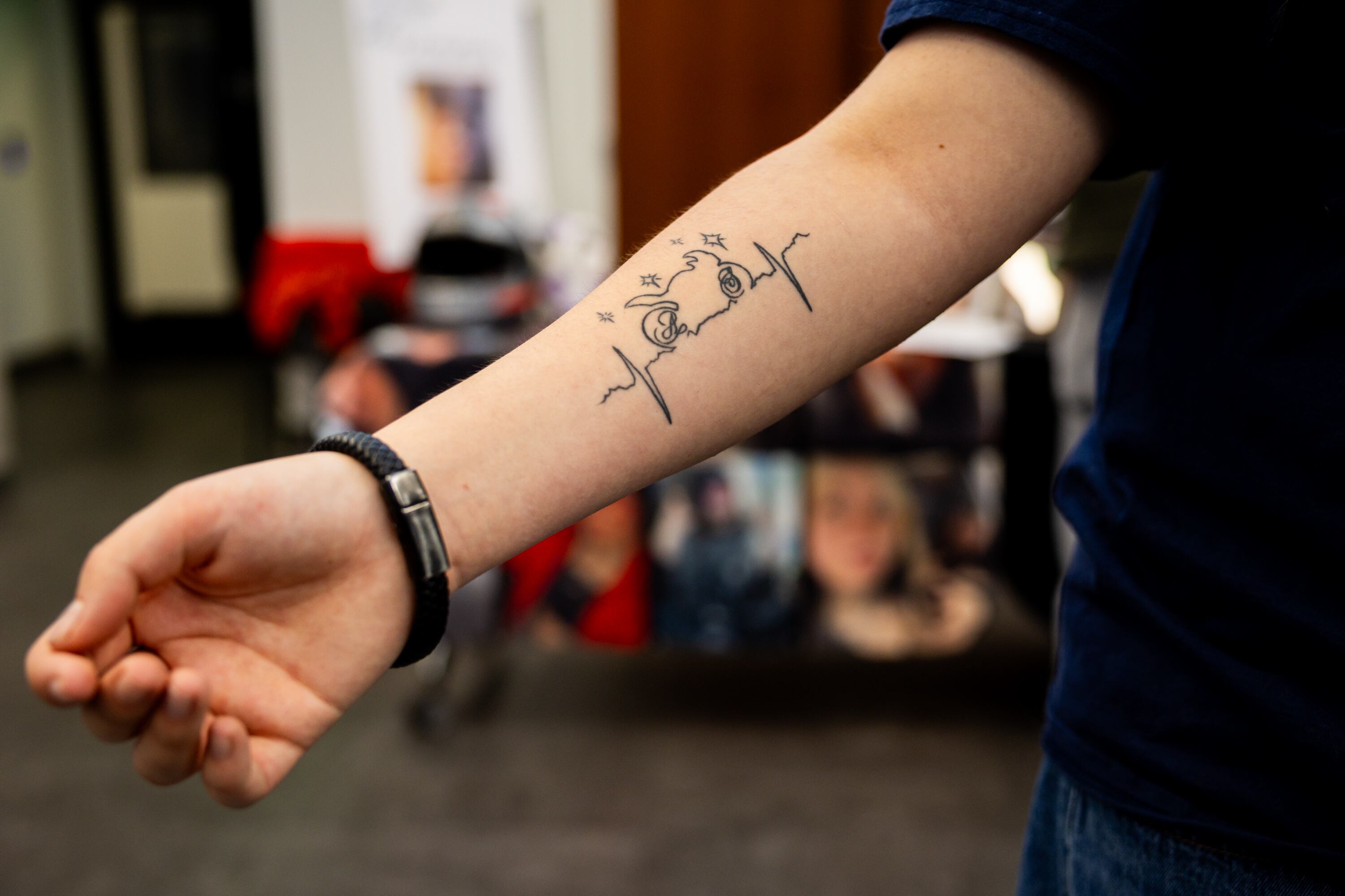 Rylee Sarle, 16, with a tattoo of the outline of a motorcycle to honor her sister, Alexus, during the 17th annual Teen Memoriam press conference in Taylorsville on Wednesday. Sarle said her sister's love was "everything about cars."