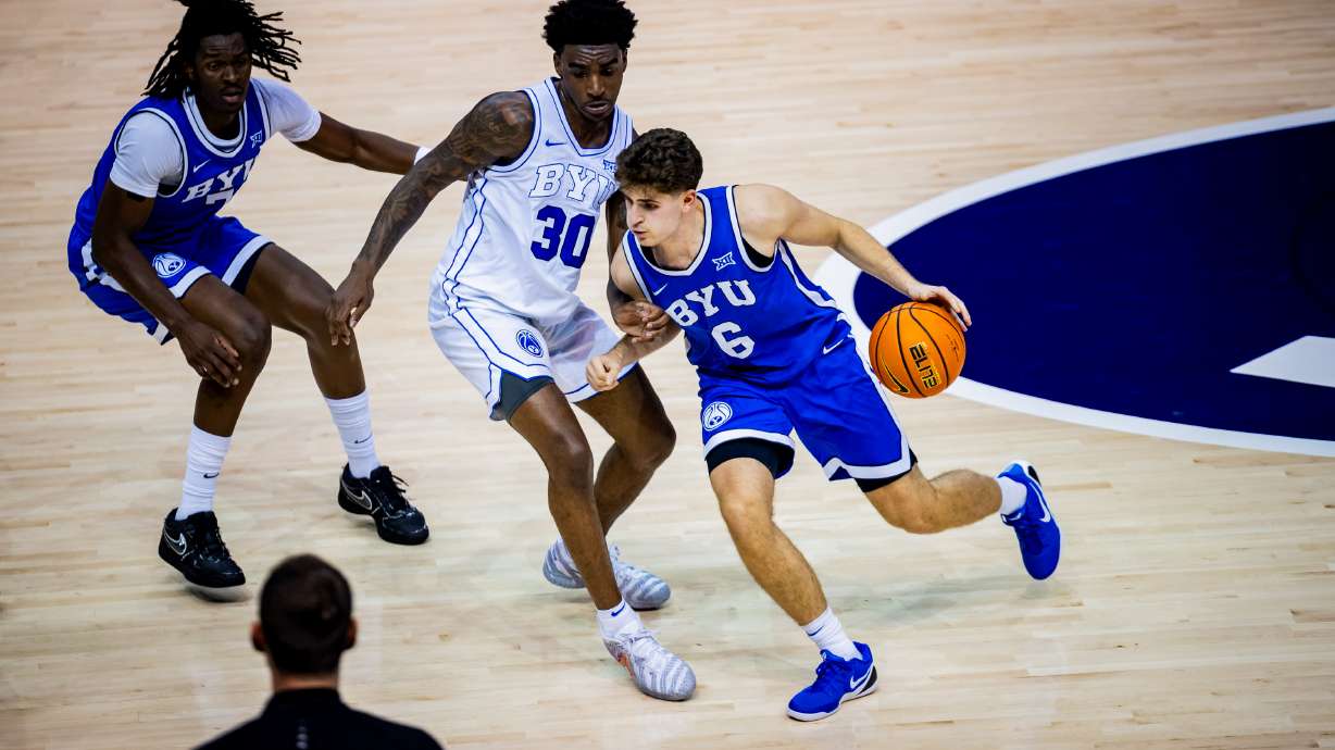 BYU basketball player Aleksej Kostić (6) dribbles the ball down the court during their annual Blue-White Scrimmage at the Marriott Center in Provo on Thursday, Oct. 9, 2025.