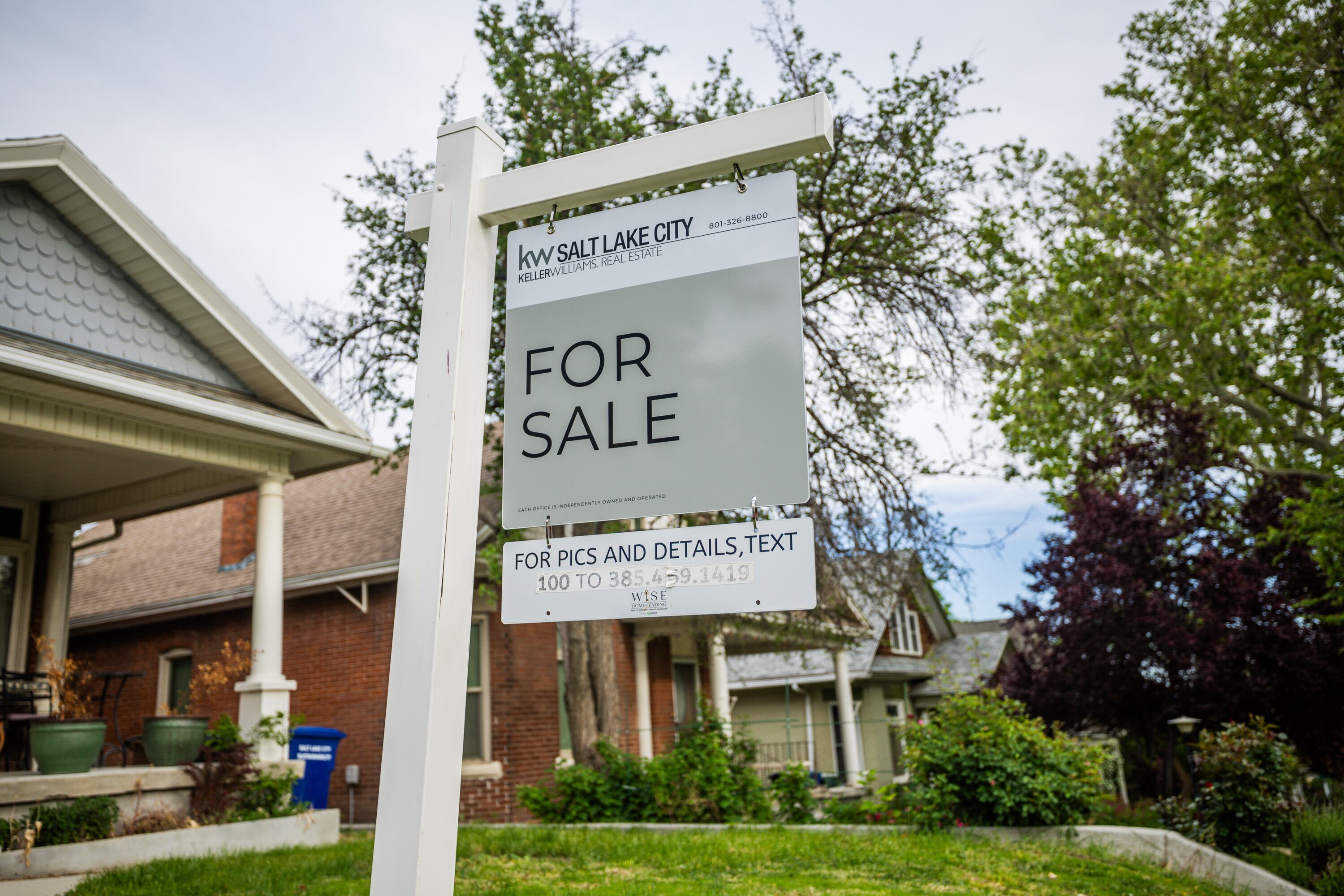 A for sale sign is posted outside a house in the Avenues neighborhood in Salt Lake City on May 23.