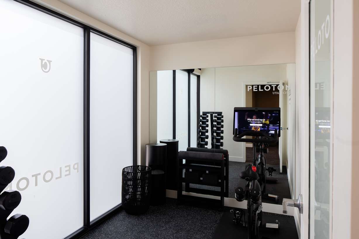 Peloton fitness equipment is shown in a Utah City residential fitness room an undated photo in Vineyard. A new partnership now allows residents in multifamily units in Utah City to access Peloton equipment.