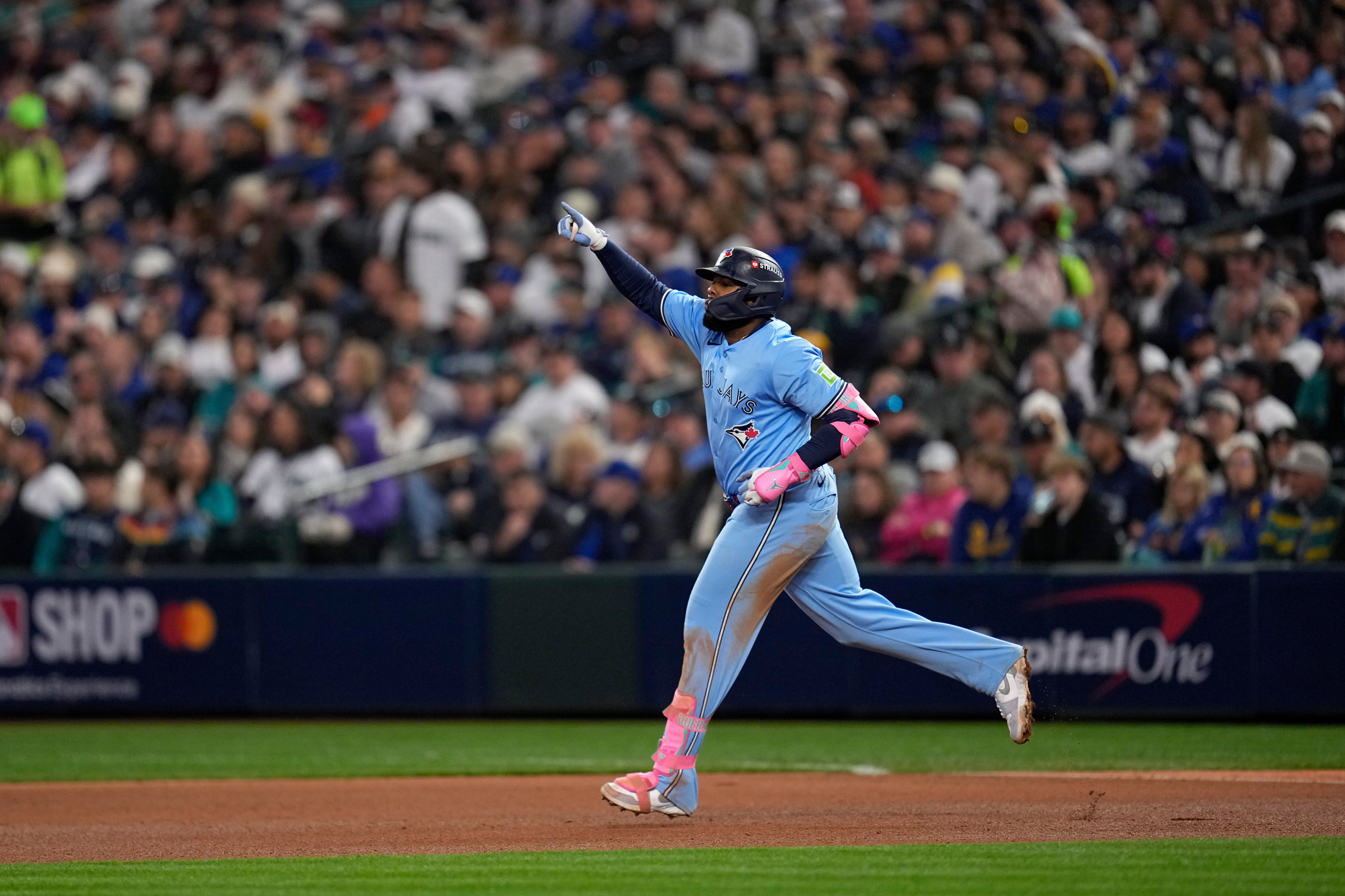 Toronto Blue Jays' Vladimir Guerrero Jr. rounds the bases after hitting a solo home run against the Seattle Mariners during the fifth inning in Game 3 of baseball's American League Championship Series, Wednesday, Oct. 15, 2025, in Seattle.