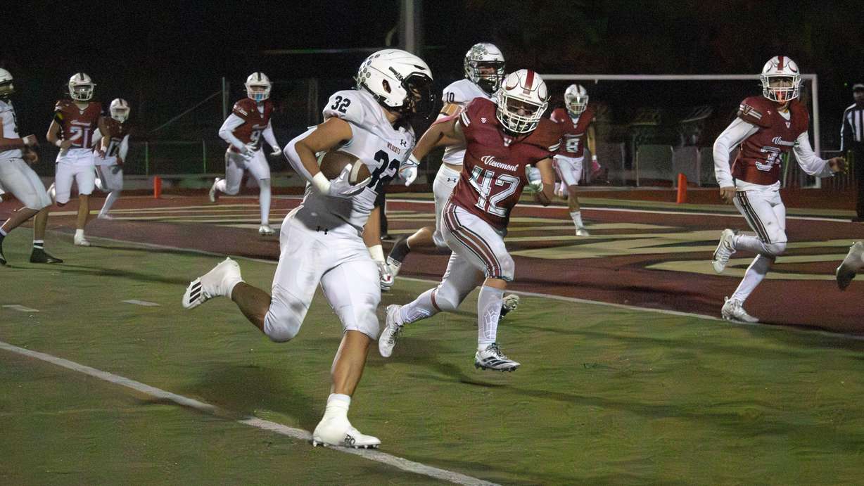 Woods Cross fullback Viliami Tapa'atoutai runs to the end zone against Viewmont on Oct. 15, 2025.