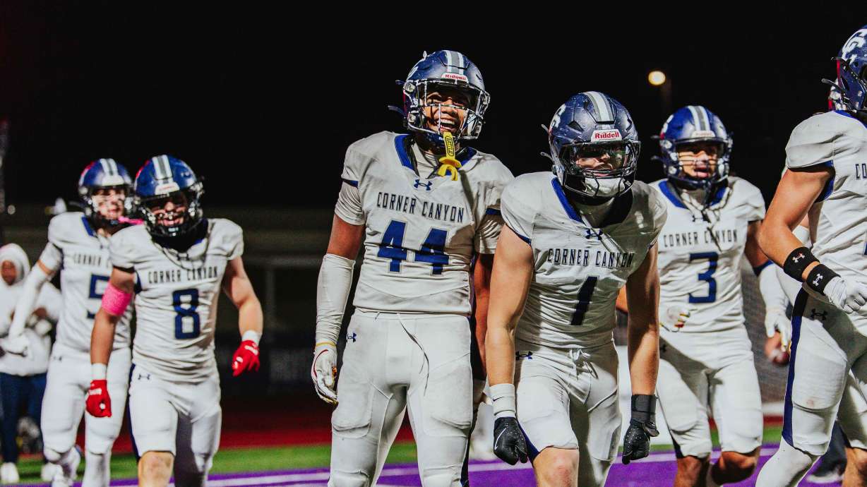 Corner Canyon's Fui Vakapuna celebrates his pick-six during a Utah high school football game against Lehi, Wednesday, Oct. 15, 2025.