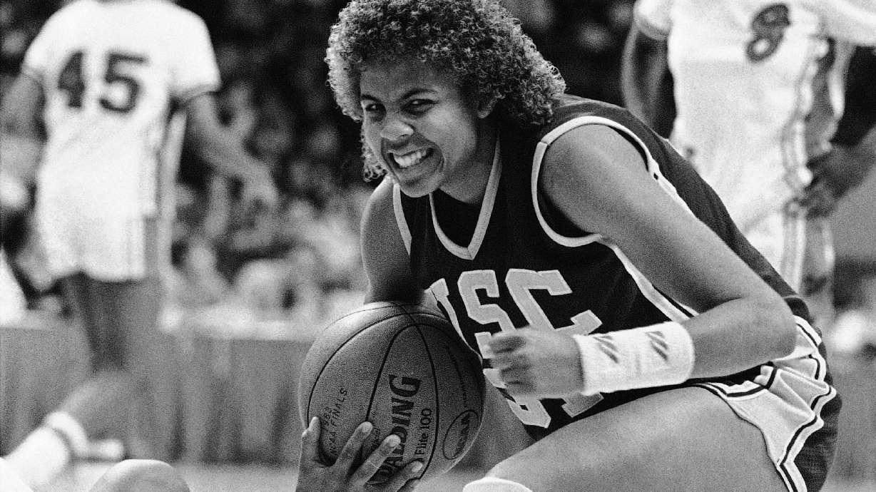 FILE - Southern California's Cheryl Miller reacts to a successful steal against the Georgia during the second half in the national semifinals of the NCAA women's college basketball tournament, Friday, April 2, 1983 in Norfolk, Va.