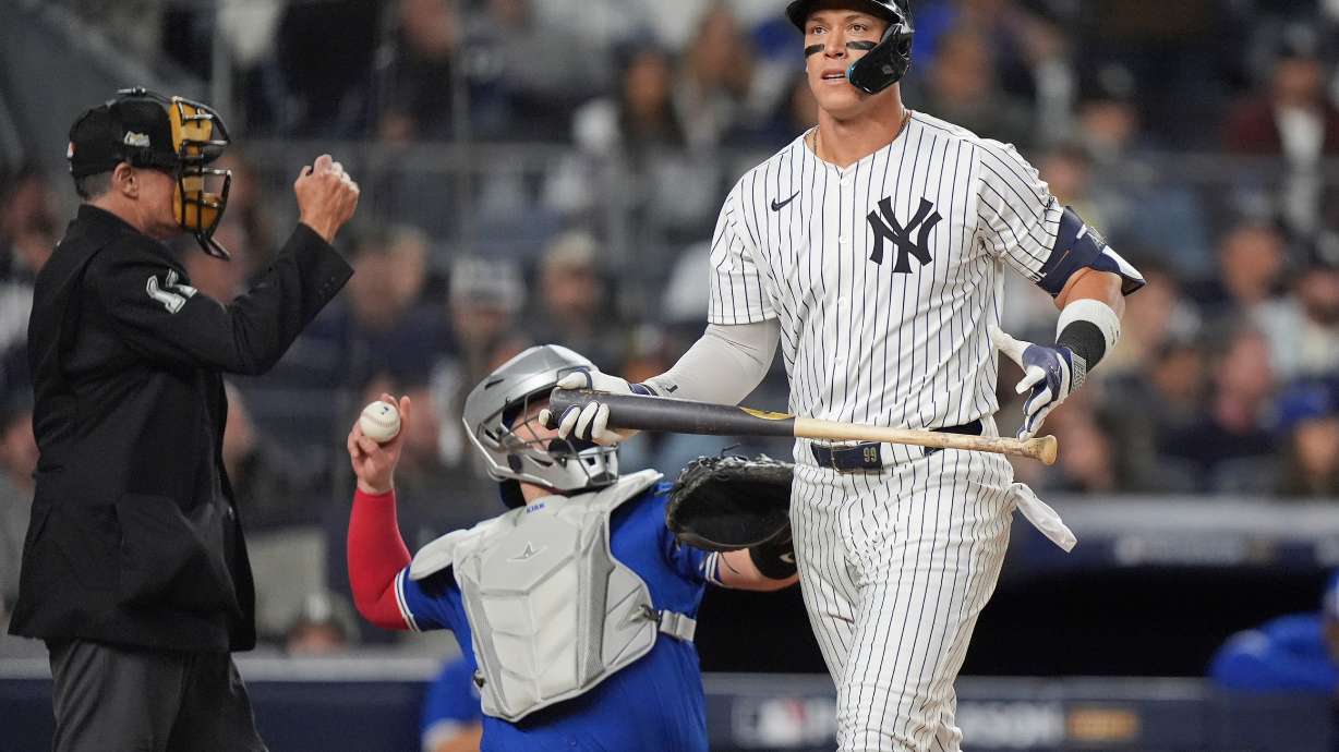 New York Yankees' Aaron Judge reacts after striking out against the Toronto Blue Jays during the eighth inning of Game 4 of baseball's American League Division Series, Wednesday, Oct. 8, 2025, in New York.