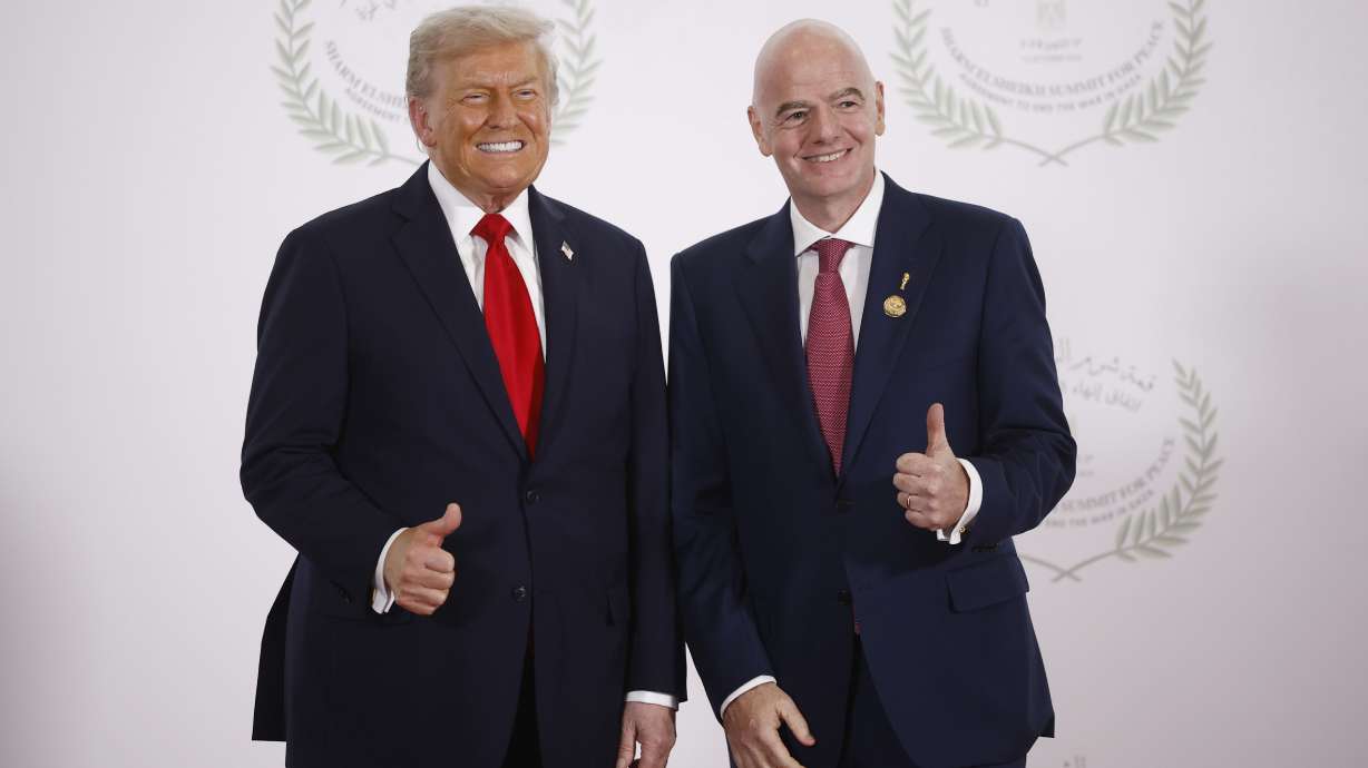 President Donald Trump and FIFA President Gianni Infantino pose during the greetings ceremony before the family picture at the Gaza Peace Summit in Sharm el-Sheikh, Egypt, Monday.