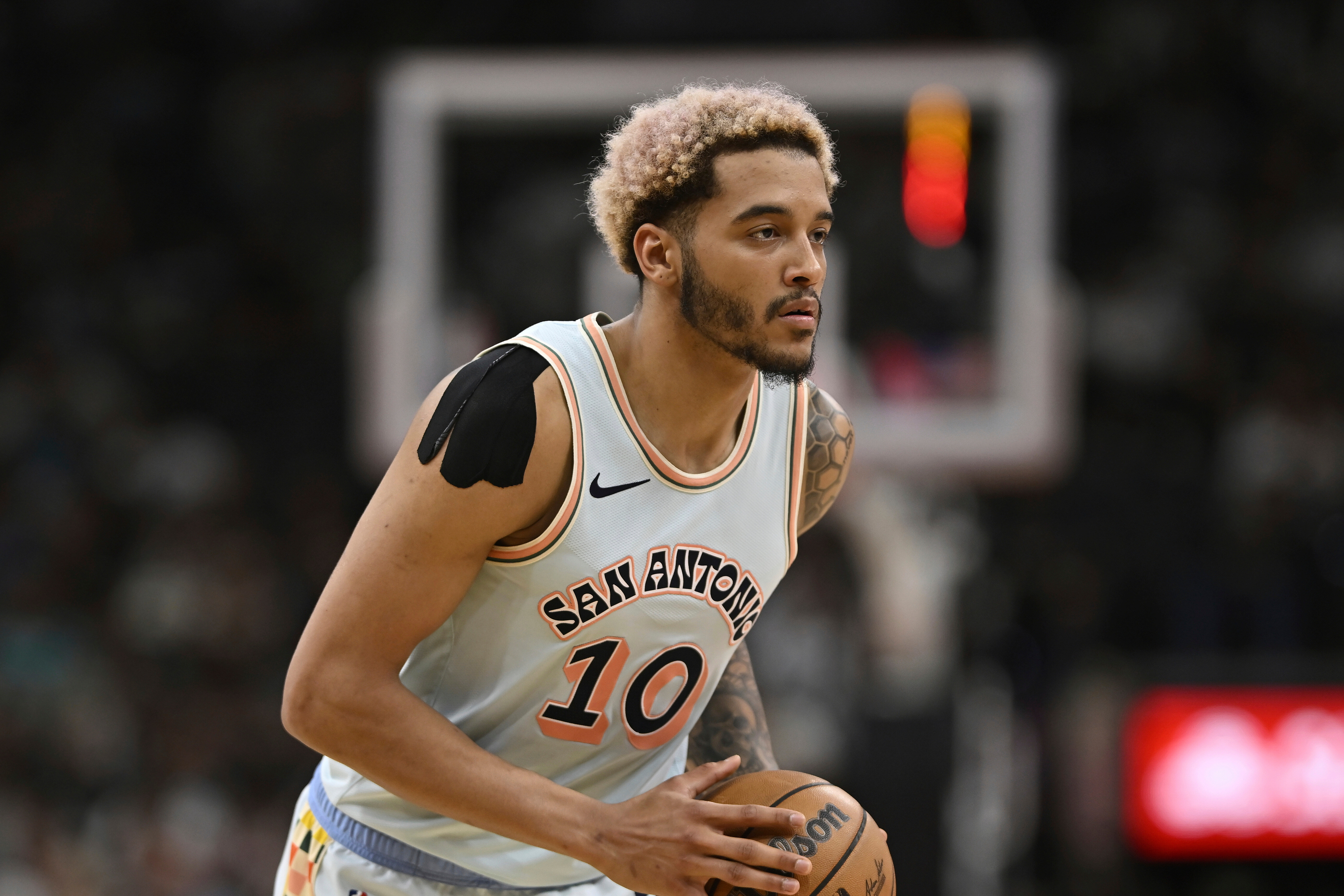 FILE - San Antonio Spurs' Jeremy Sochan runs up court during an NBA basketball game against the Boston Celtics, March 29, 2025, in San Antonio.