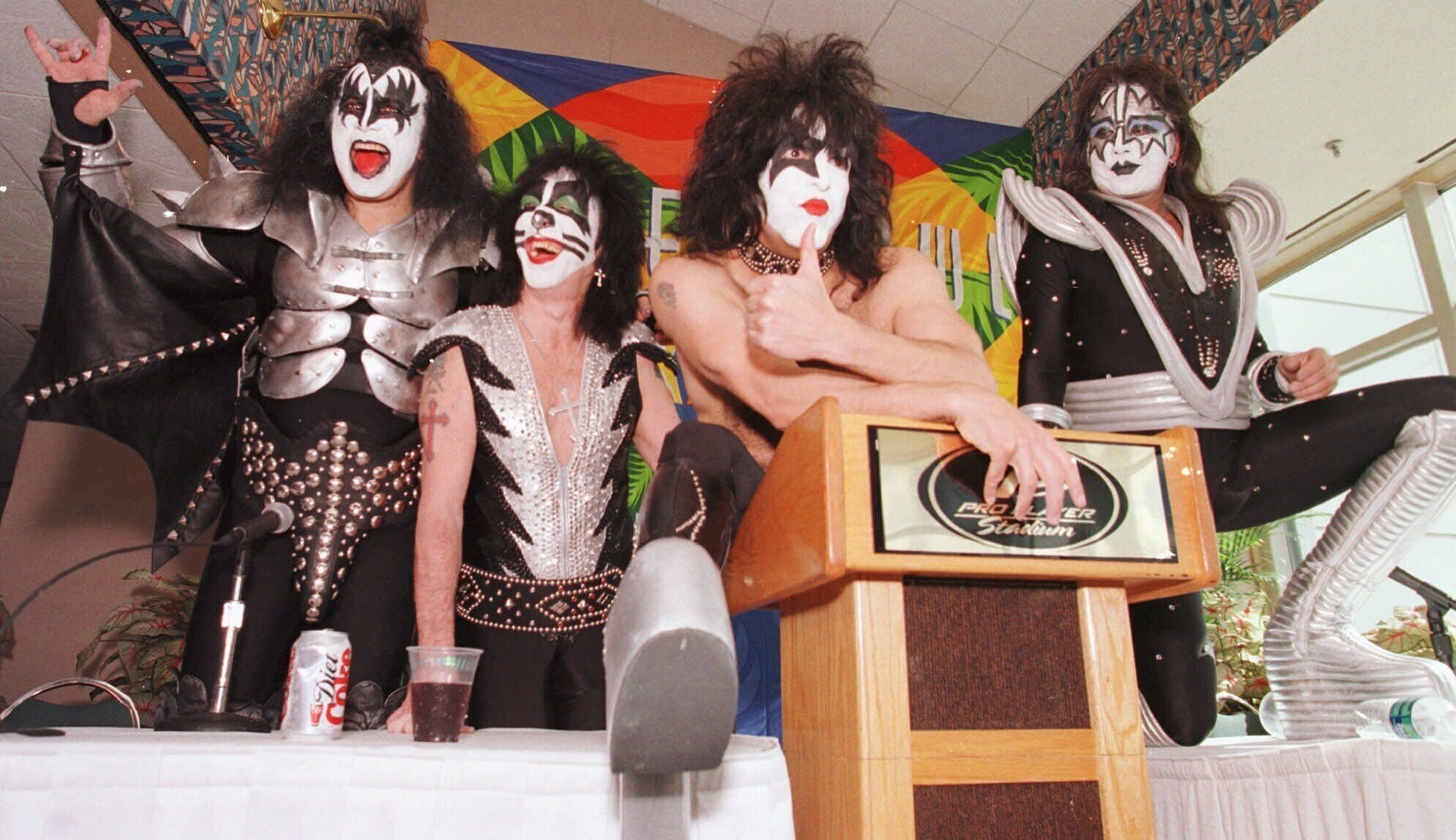 Members of the rock group Kiss during a news conference, Jan. 29, 1999, at Pro Player Stadium in Miami. Ace Frehley, the original lead guitarist, died Thursday at the age of 74.