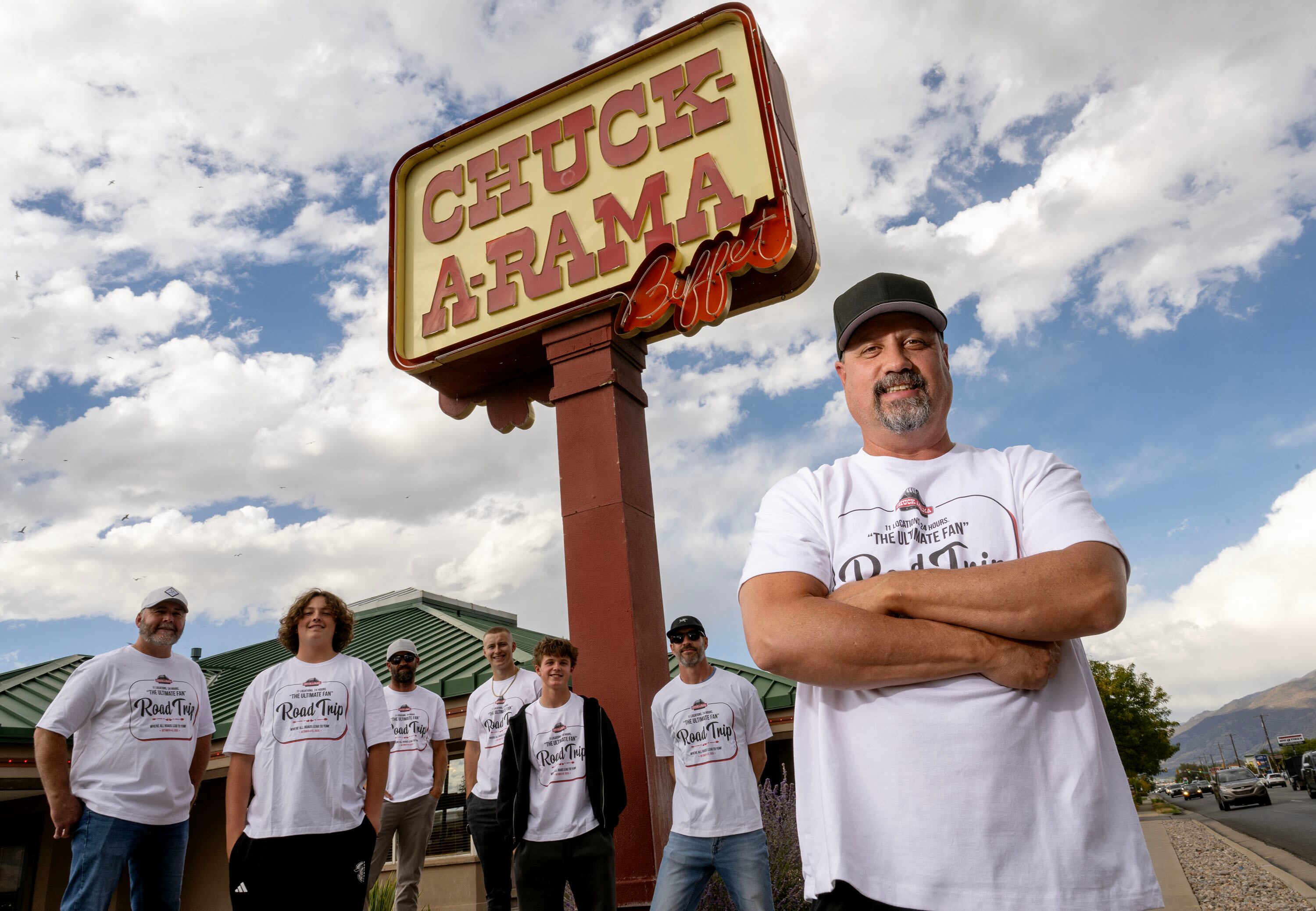 Utah resident Adam Boswell poses with a group of friends and family, Cormick Campbell, Case Campbell, Nate Boswell, Oakley Lawrence, Crue Boswell and Preston Boswell, as he embarks on a multi-state Chuck-A-Rama marathon on Oct. 3.