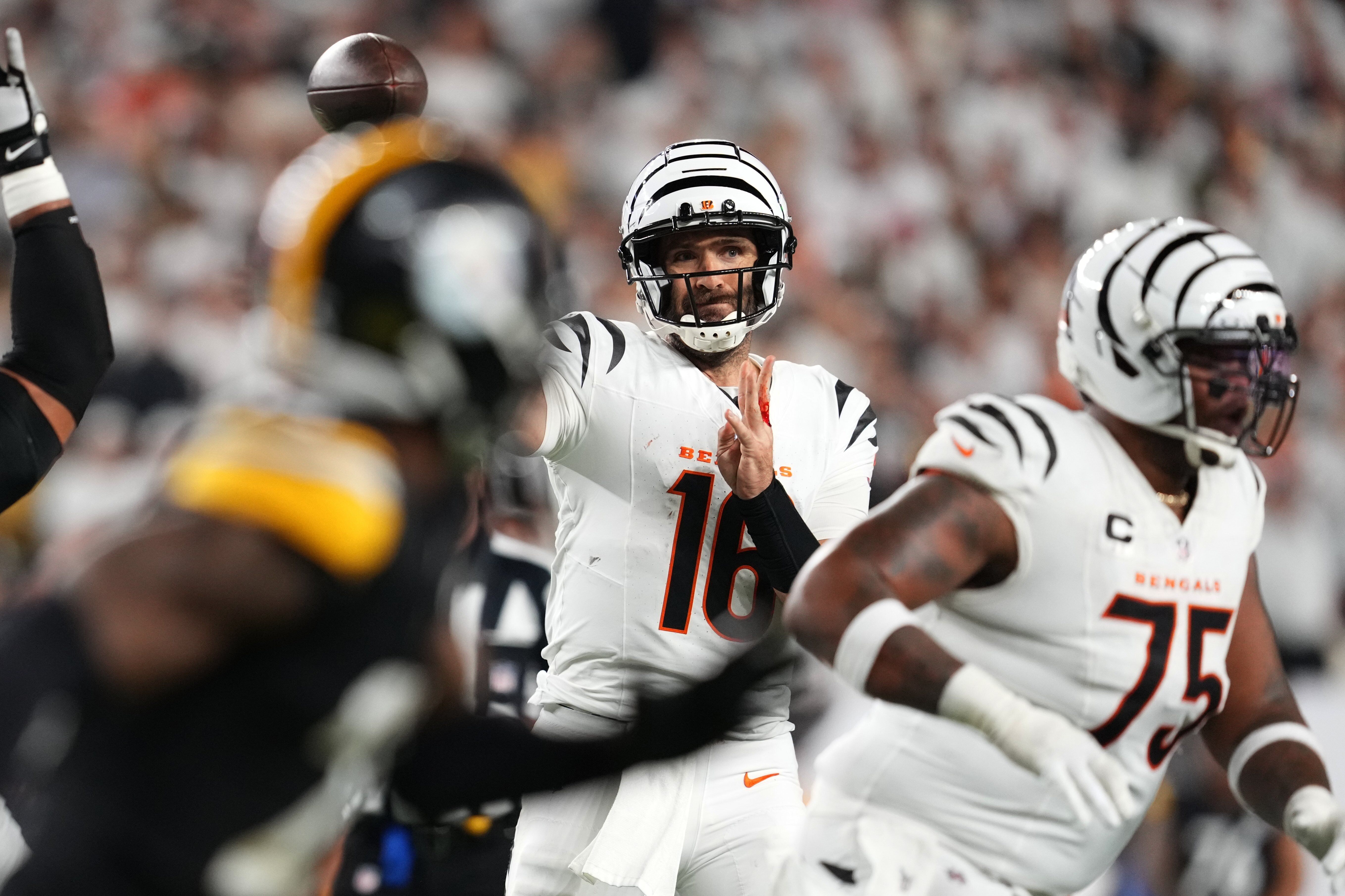 Cincinnati Bengals quarterback Joe Flacco (16) throws a pass during the second half of an NFL football game against the Pittsburgh Steelers in Cincinnati Thursday, Oct. 16, 2025.