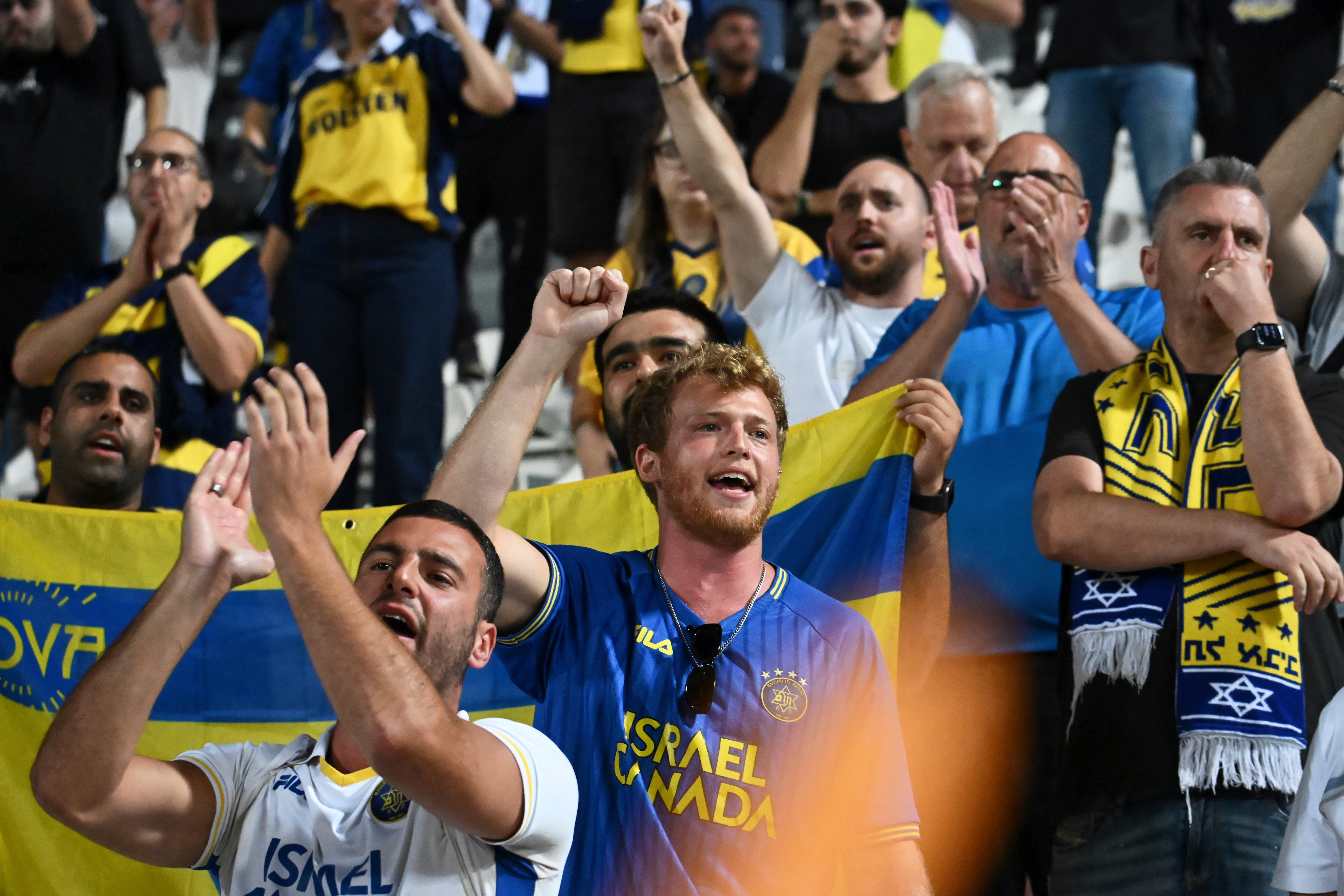 FILE -Maccabi Tel Aviv's fans clap hands after the end of the Europa League soccer match between PAOK and Maccabi Tel Aviv at Toumpa stadium, in Thessaloniki, Greece, Sept. 24, 2025. 