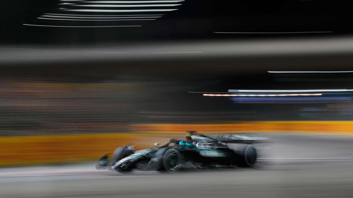 Mercedes driver George Russell of Britain powers his car during the Singapore Formula One Grand Prix at the Marina Bay Street Circuit in Singapore, Sunday, Oct. 5, 2025.